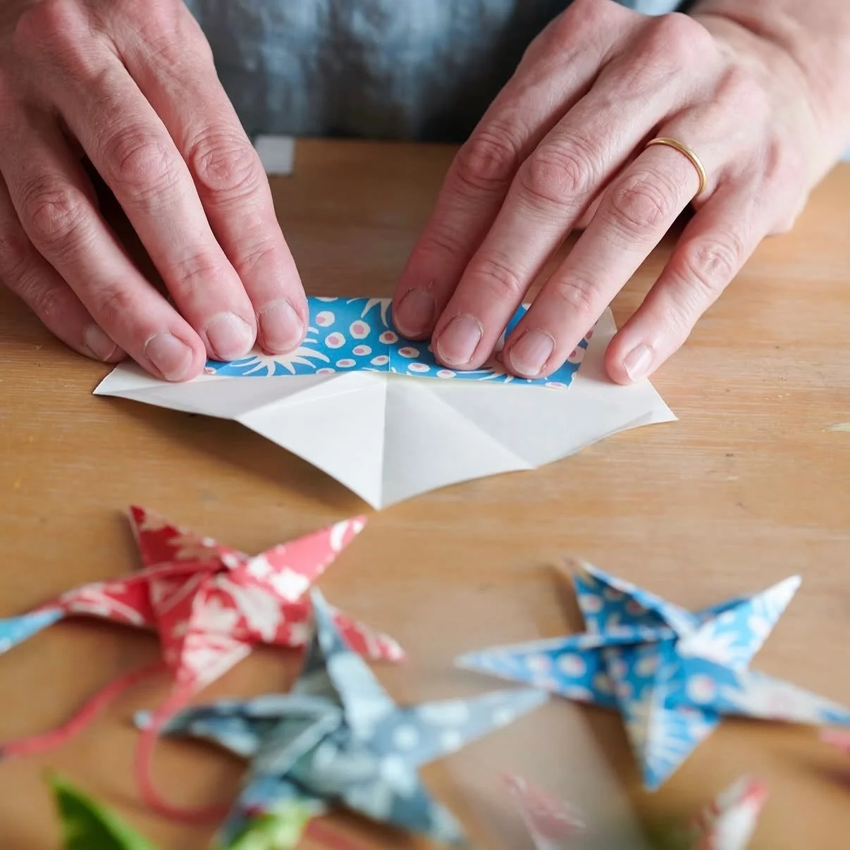 I love a little craft and these origami star garland kits by @cambridgeimprint are perfect thing to make with friends and family this holiday weekend. We are open today and Sunday, but will be CLOSED Saturday for the 4th 🎆 #cambridgeimprint #origami