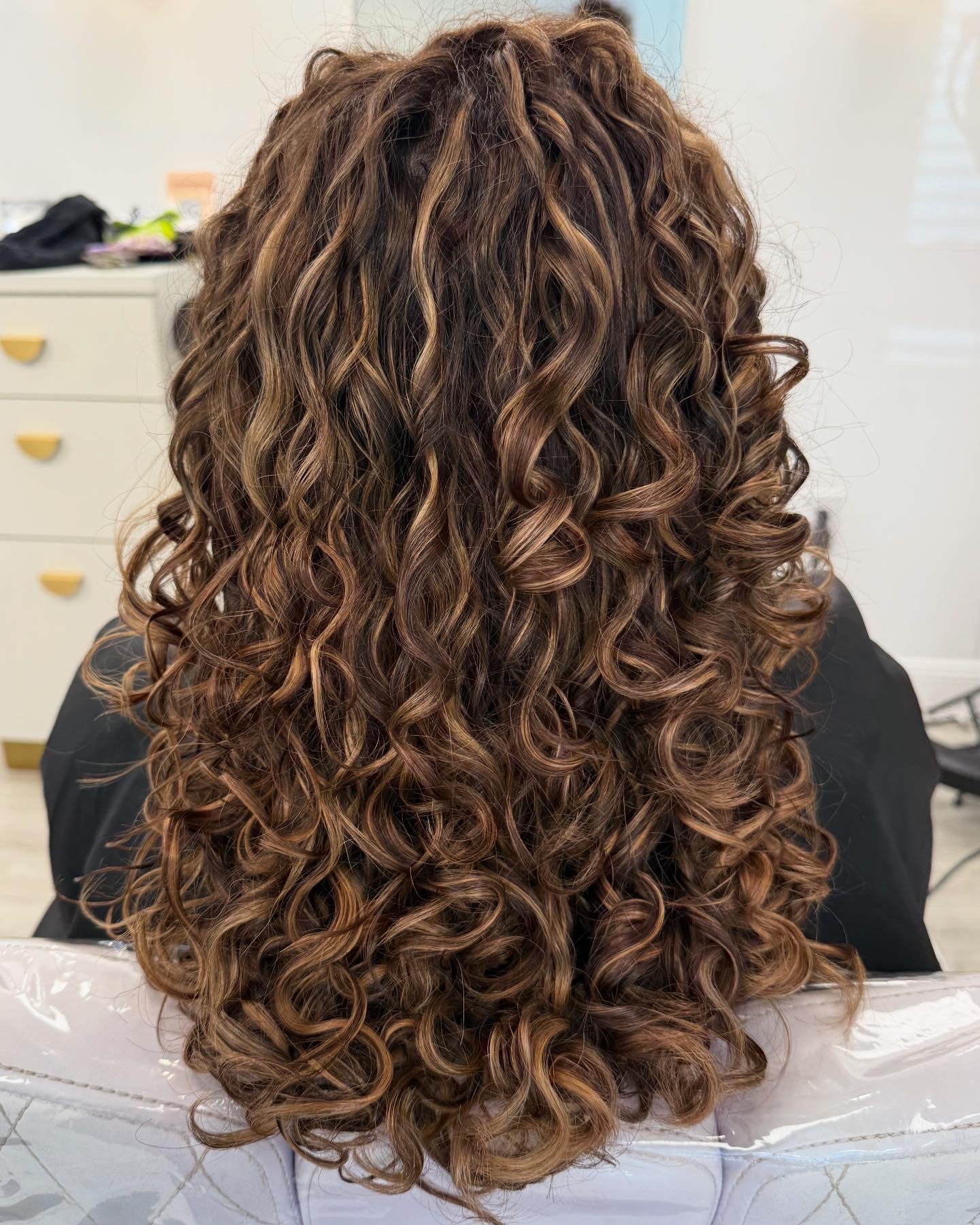 stunning transformation with curly hair