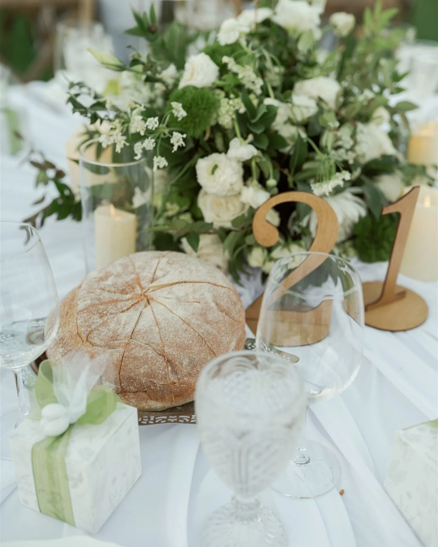 Nicoletta &amp; Manoli's wedding reception was a celebration of elegance and tradition. The classic green and white color palette was heightened by lush florals and lavish draping with touches of crystal. Located far from the city, the vast hills sur