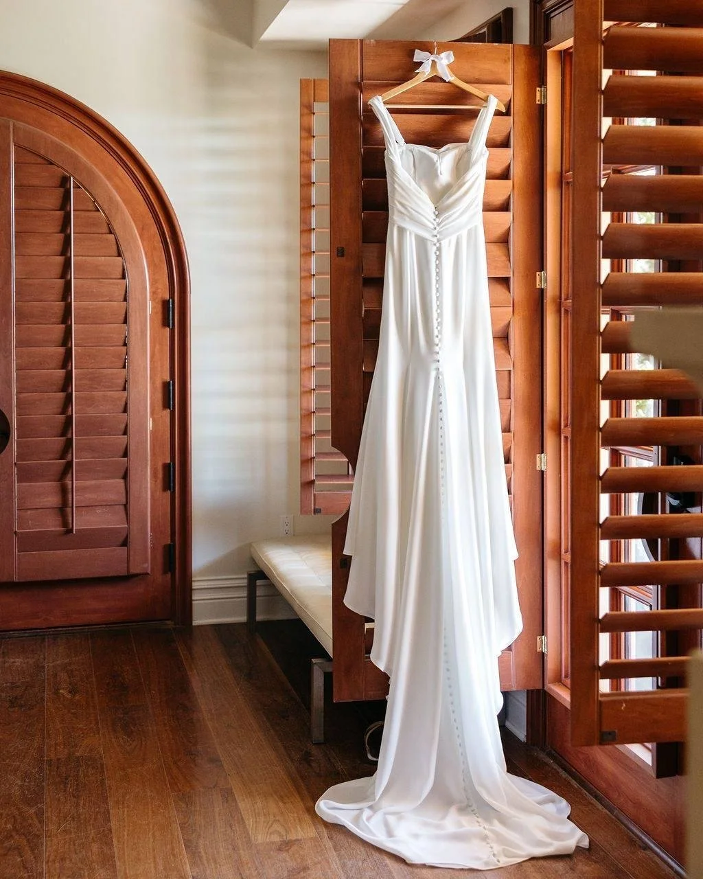 A touching first look before a beautiful white ceremony accompanied by live music and adorable flower girls.

Beauty: @thequeensbees 
Catering: @chefs_table_catering 
Dessert: @slomamasweets 
DJ: @kramerevents 
Florals: @maunaflorist 
Live Music: @ma