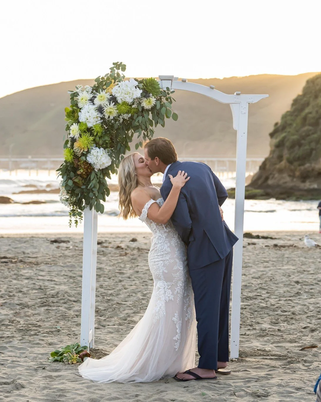 A cinematic seaside ceremony at golden hour. 😍

This was one of our quickest weddings yet, with only two weeks to plan! Thank you to our vendor team and the couple's friends &amp; family for coming together to create this wonderful day.

Bar &amp; C