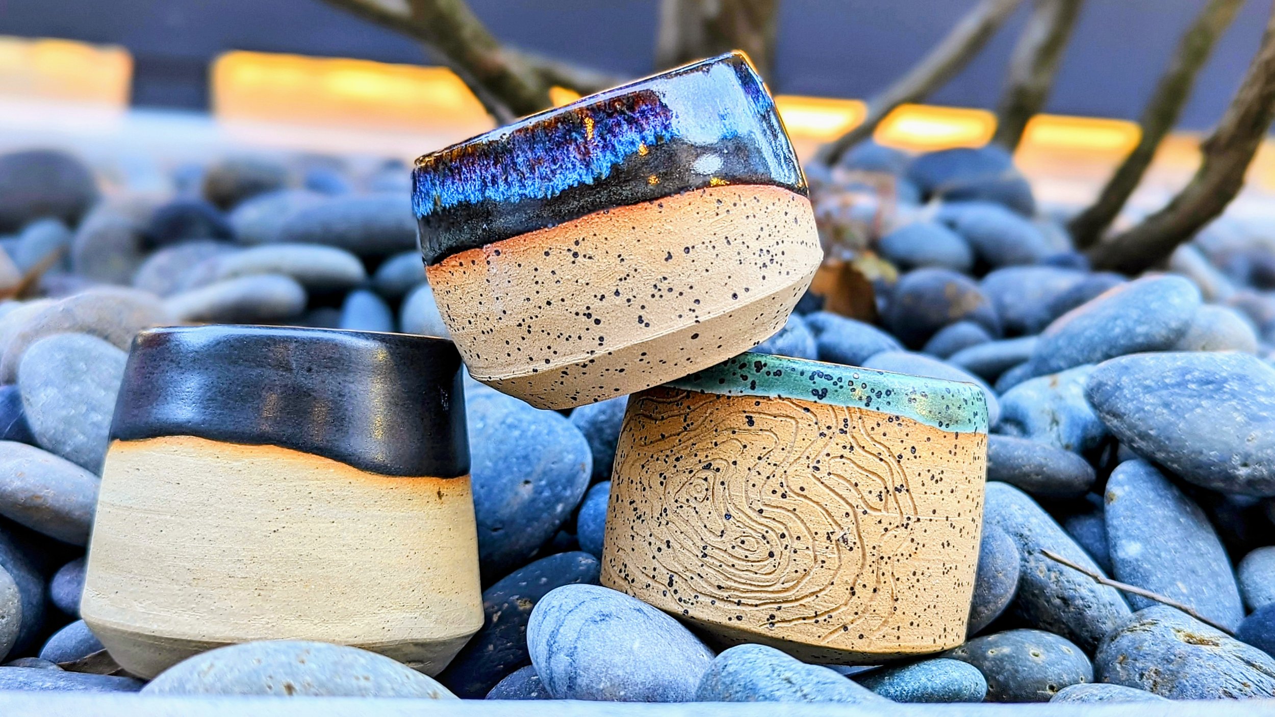 4 oz cups on rocks.jpg