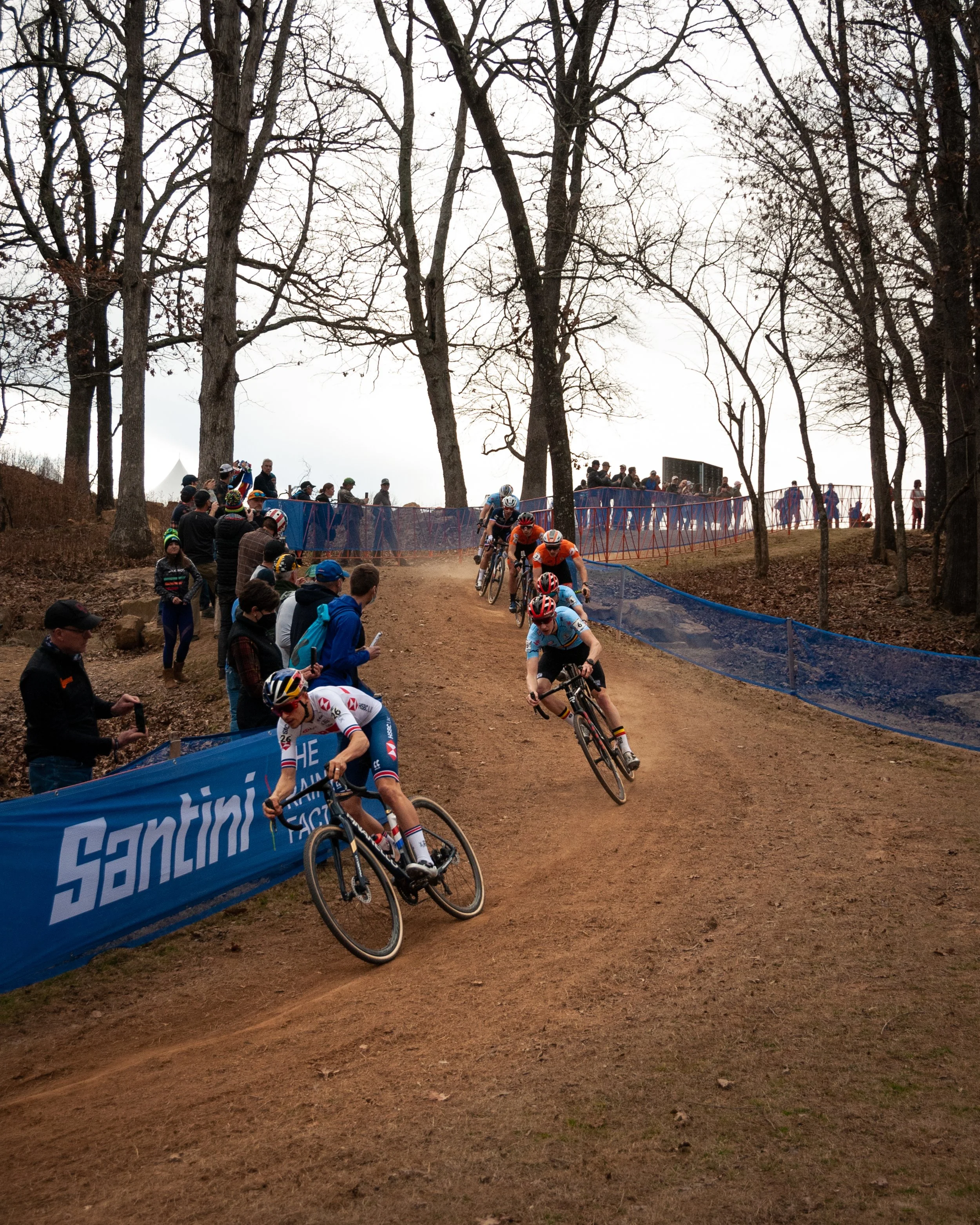 Tom Pidcock leads a group of riders down one of the descents on the Cyclocross World Championships course. 