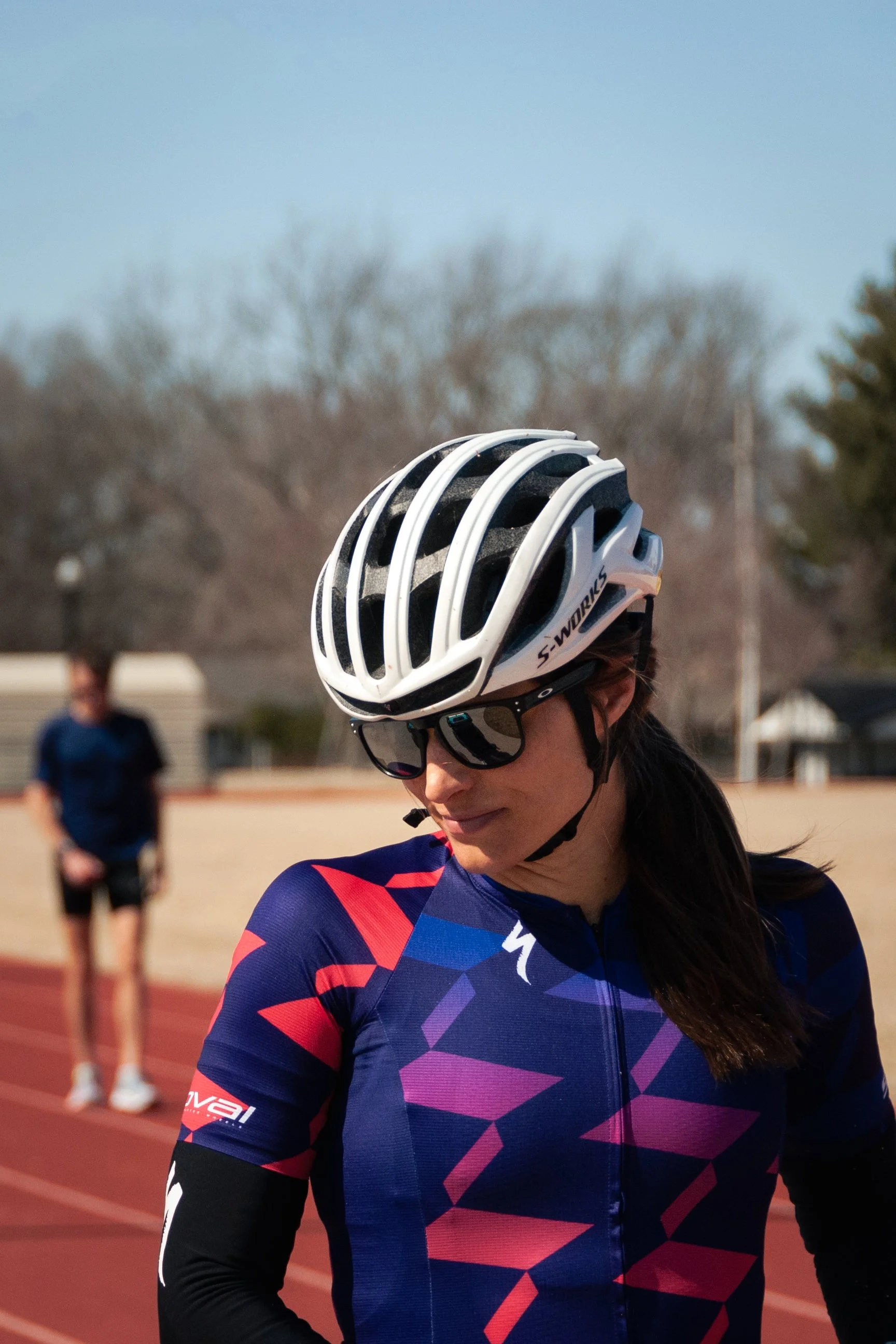 Sarah at the track supporting Ben during one of his track workouts. 