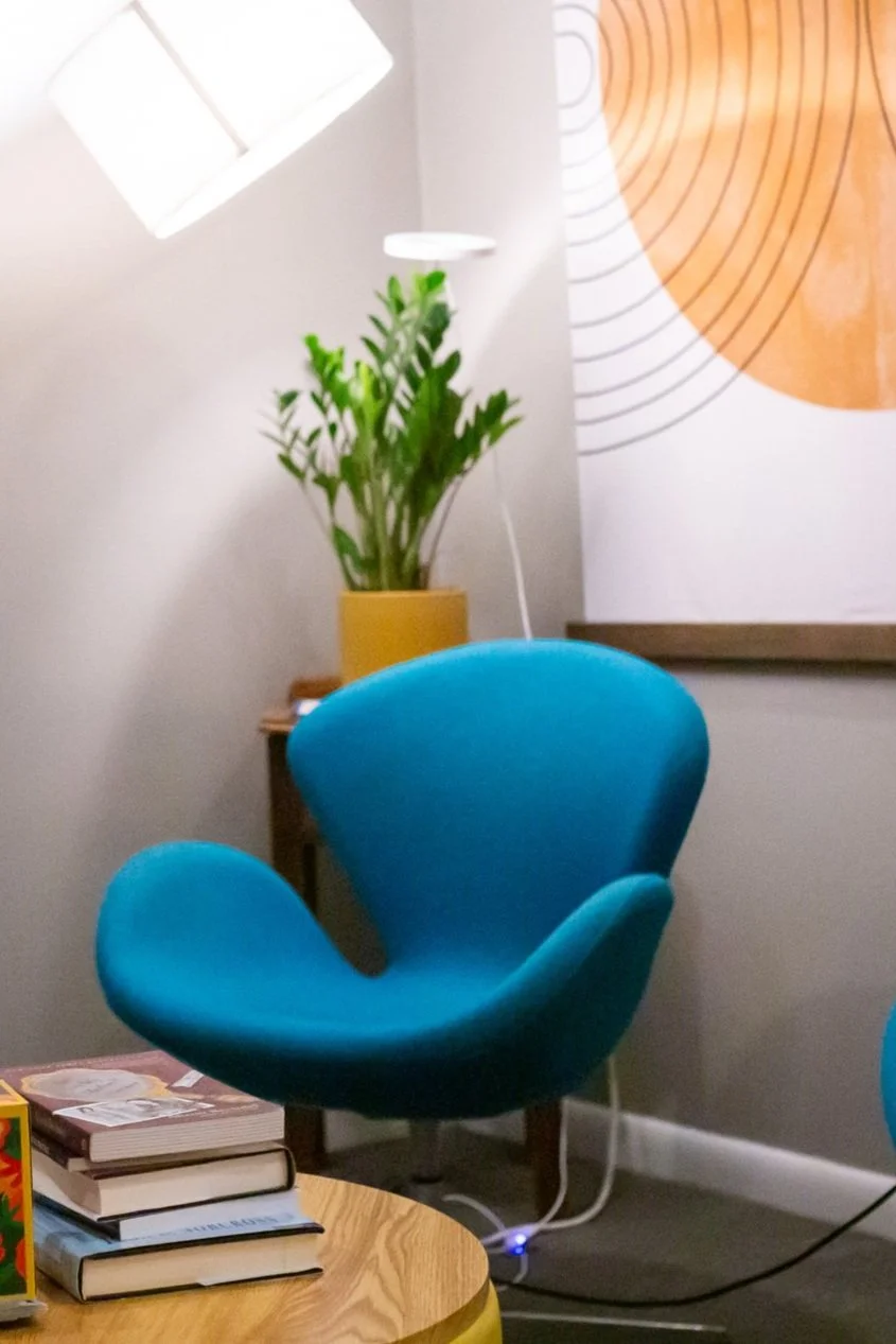 Teal armchairs in an individual therapy office in Washington DC