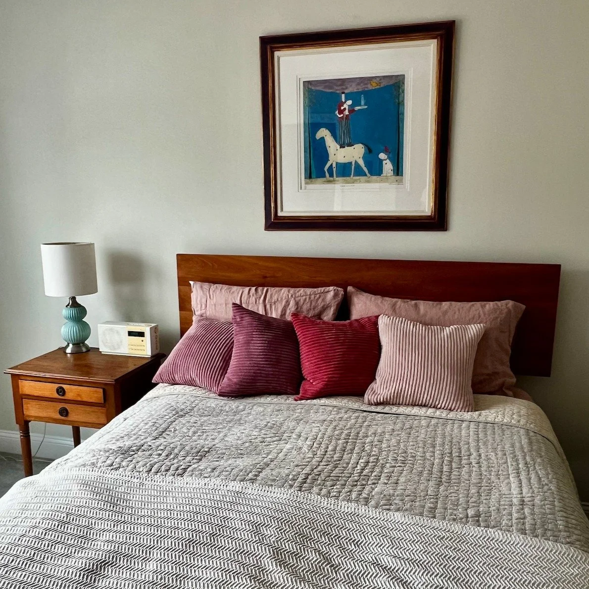 I've been hanging pictures, and getting into the zen of measuring, pencil marks, and tap tap tap, putting in the hangers. 

Art on your walls is what completes the room and makes it personal. 

It gives you something nice to stare at when you need a 