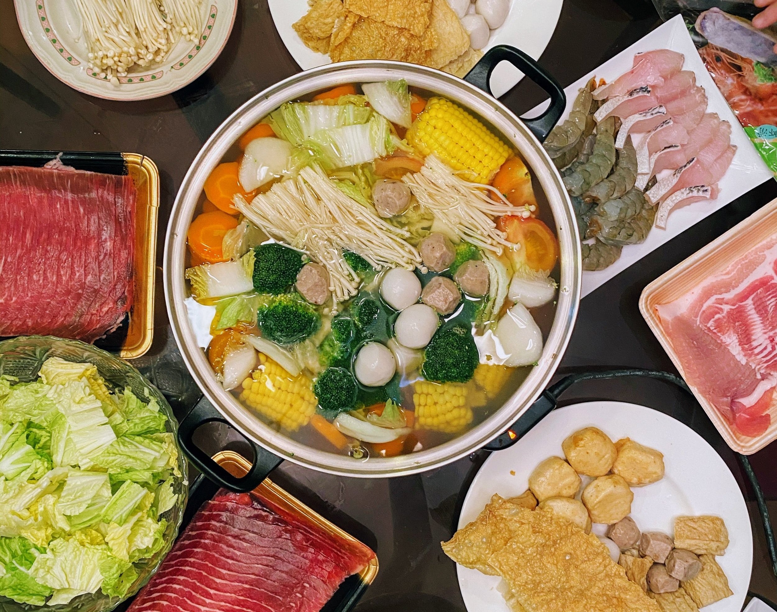 tasting a variety of traditional Singaporean dishes at a vibrant food market, experiencing authentic cultural flavors and community atmosphere.