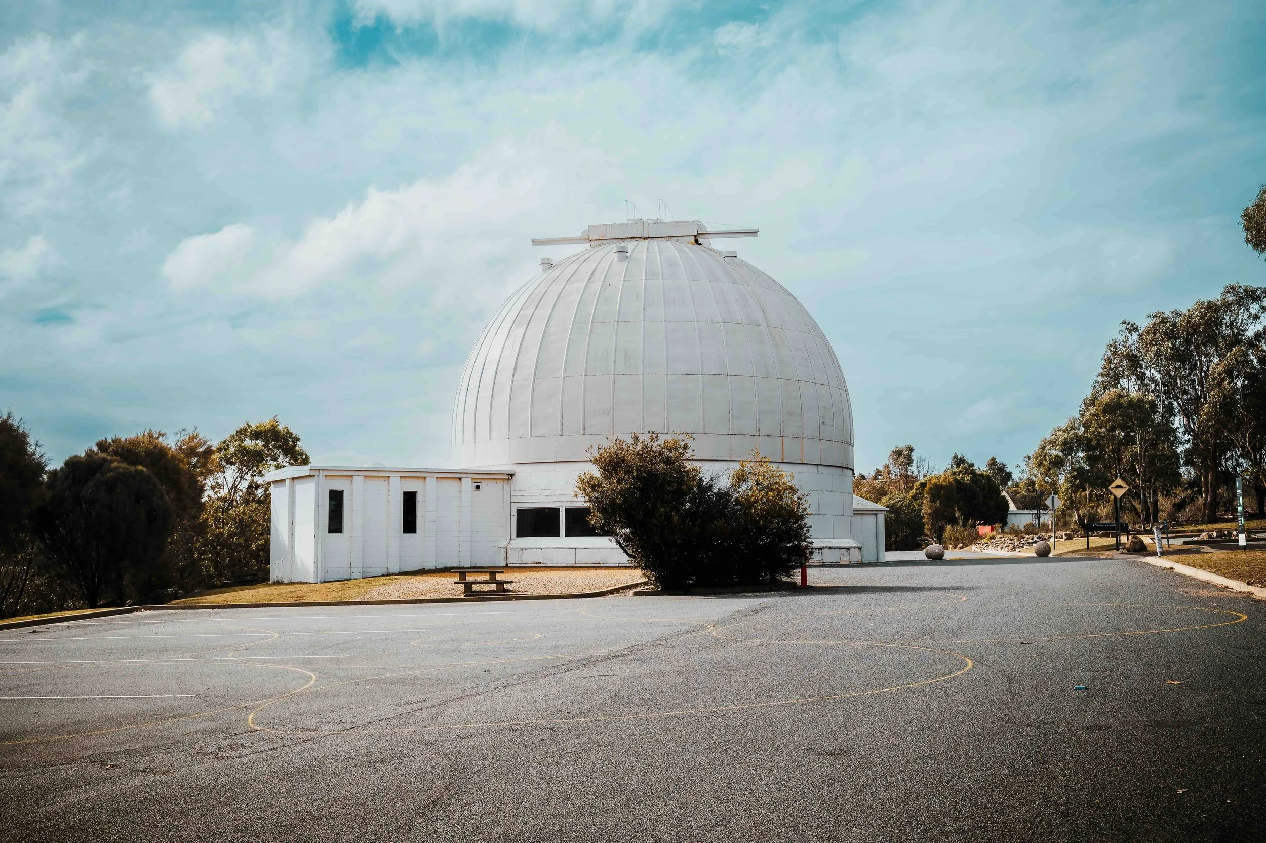 The iconic white dome of Mount Stromlo Observatory, Canberra — a key astronomy and space science destination on Libertas Travel's STEM high school excursions in the ACT.