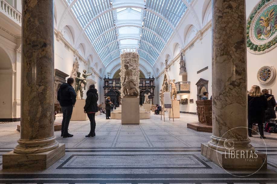 Victoria and Albert London historic artworks and influential artists tour in this beautiful historic building with its carved archways and decorative elements