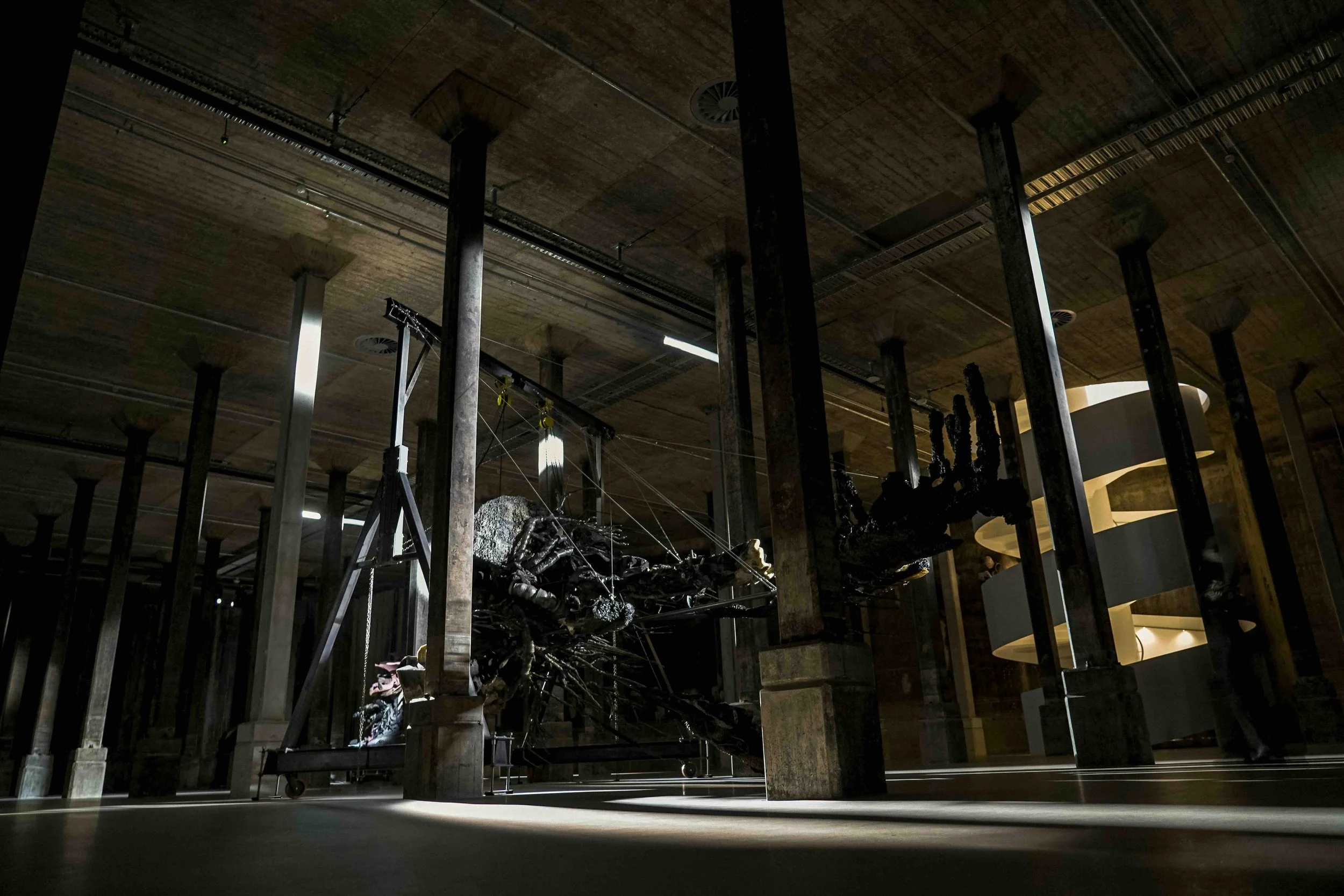 A large-scale suspended sculpture in the dramatic underground Naala Nura galleries of the Art Gallery of New South Wales, Sydney — a world-class Contemporary and First Nations art experience on Libertas Travel's Sydney Creative Arts excursions.