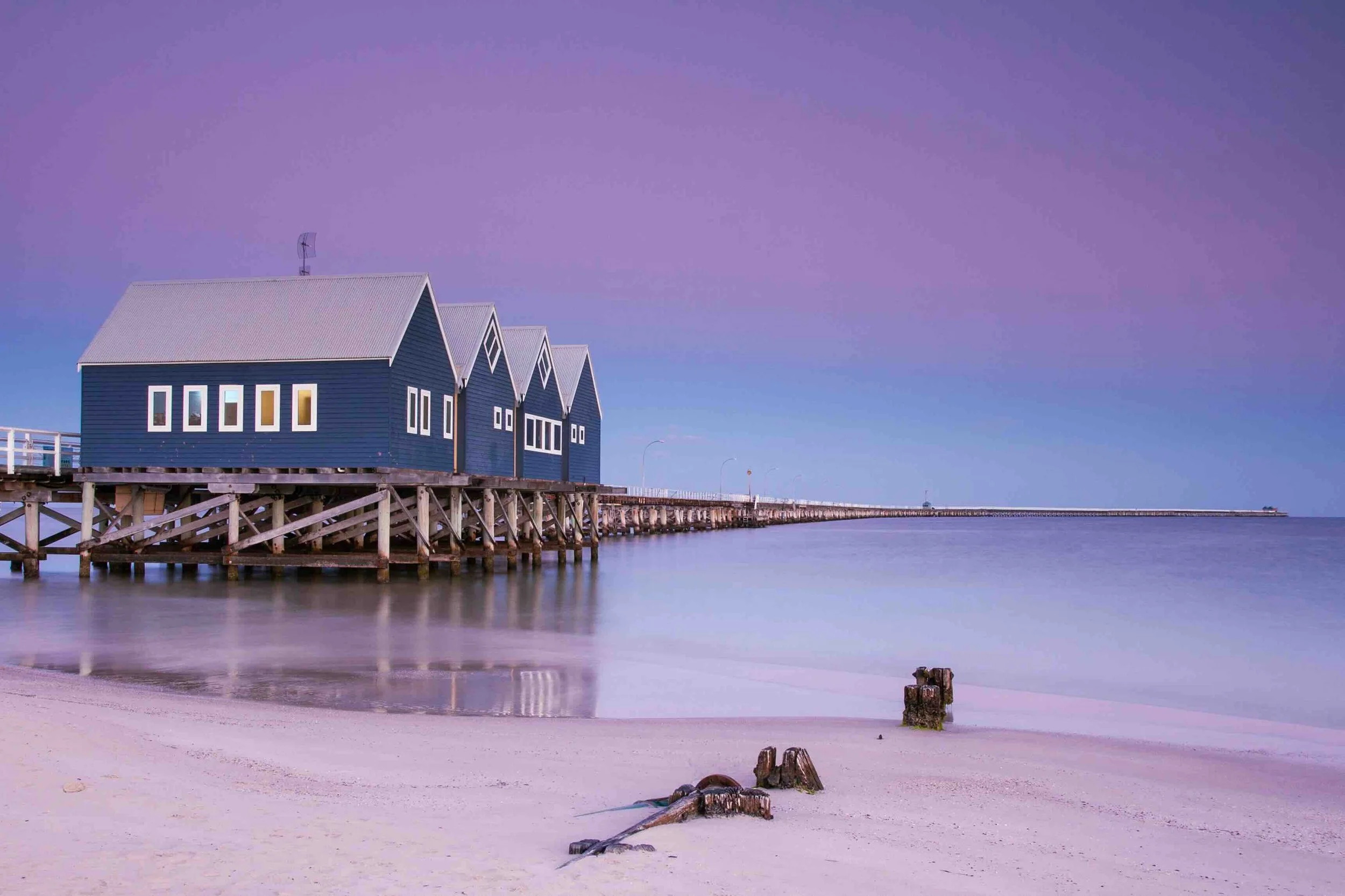 The iconic Busselton Jetty stretching into still lavender waters at dusk, Western Australia — a marine science and geography landmark on Libertas Travel's WA high school excursion.