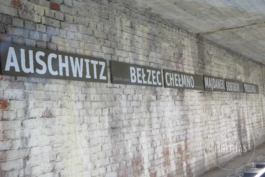Nuremberg Documentation Centre white brick wall with Auschwitz sign