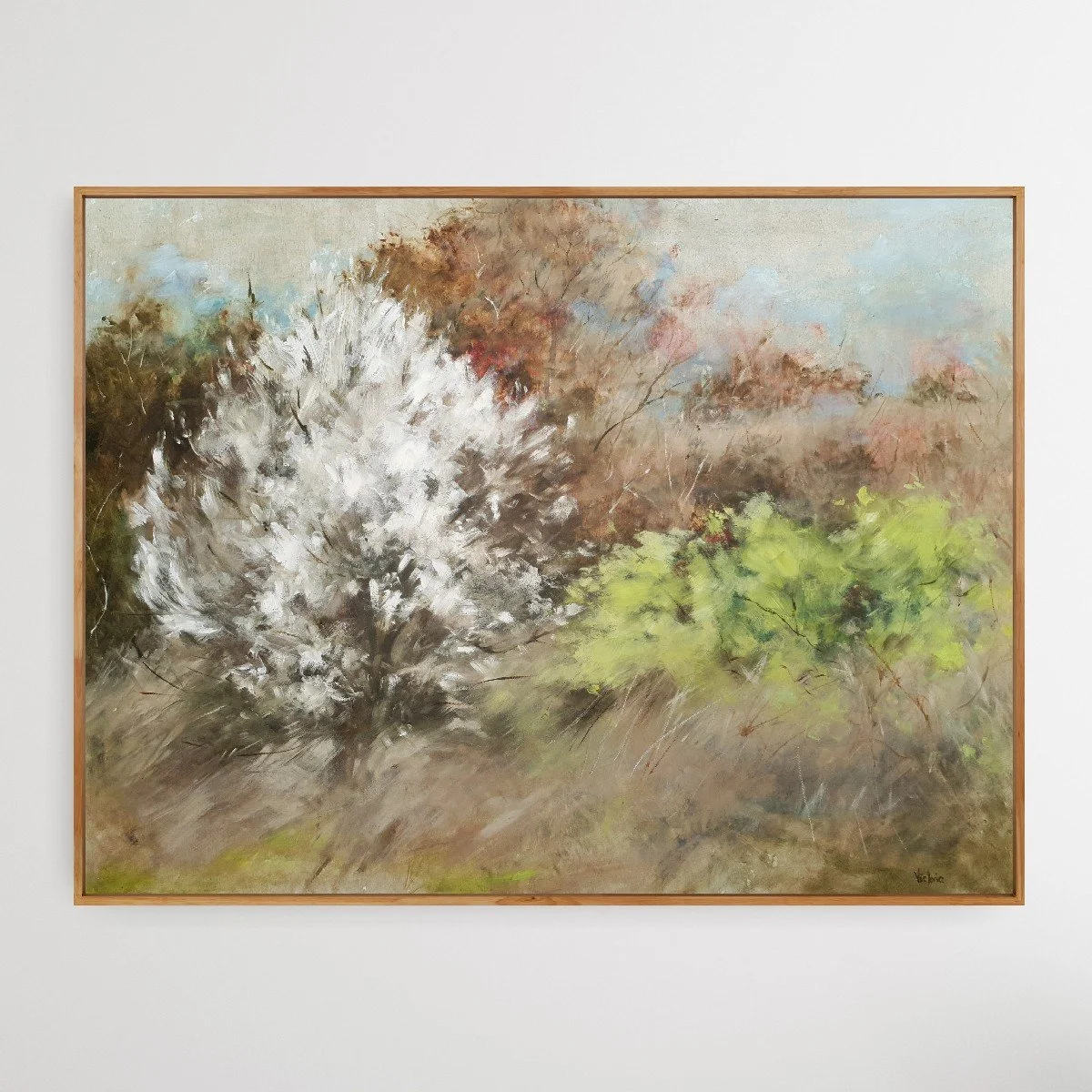 Soft abstract landscape in natural earth tones of light brown and white with cherry blossom.