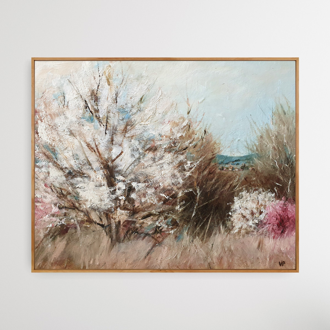 oft abstract landscape in natural earth tones of light brown and white with cherry blossom.