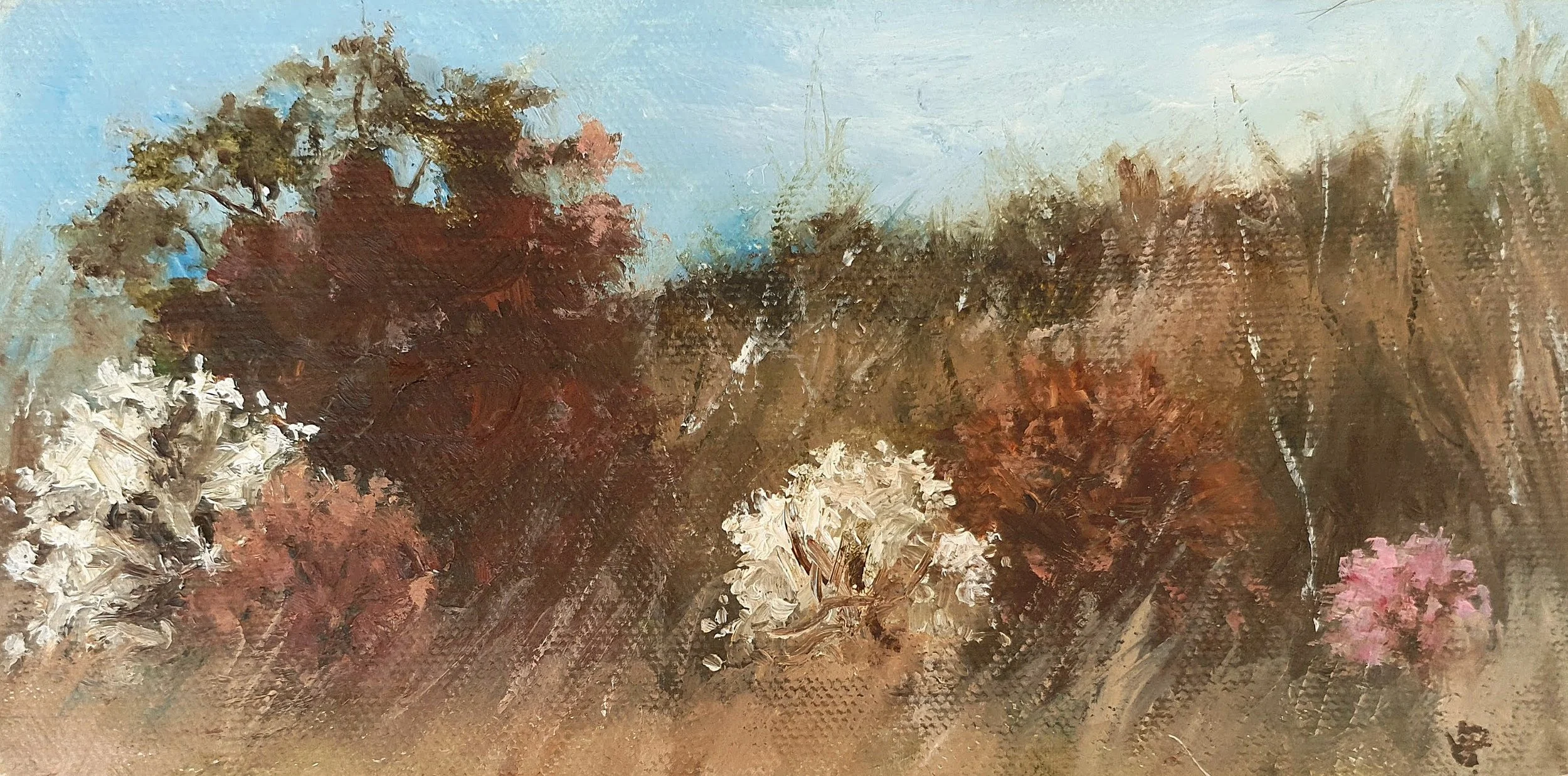 Soft abstract landscape in natural earth tones of light brown and white with cherry blossom.