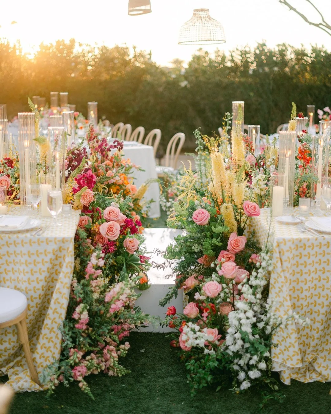 A day overflowing with blooms in every direction. The center stage for dances and speeches framed by lush florals made every moment feel that much more special. 

Planning and Design: @chererosalieweddings
Photography: @sarabishop.co
Video: @got.hitc