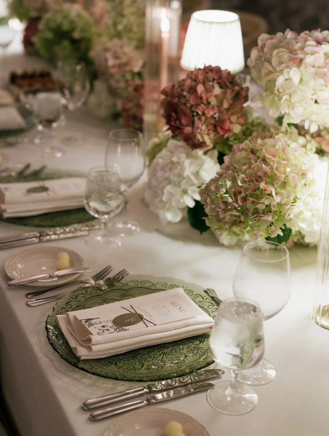 Lush hydrangeas, rich burgundy blooms, and candlelight made this reception feel warm, inviting, and unforgettable.

Planner: @audreywoodevents⁠
Venue: @omnimontelucia 
Makeup: @daniellevirginianastasi⁠
Florist: @floralsbykendra⁠
Photographer: @nataly