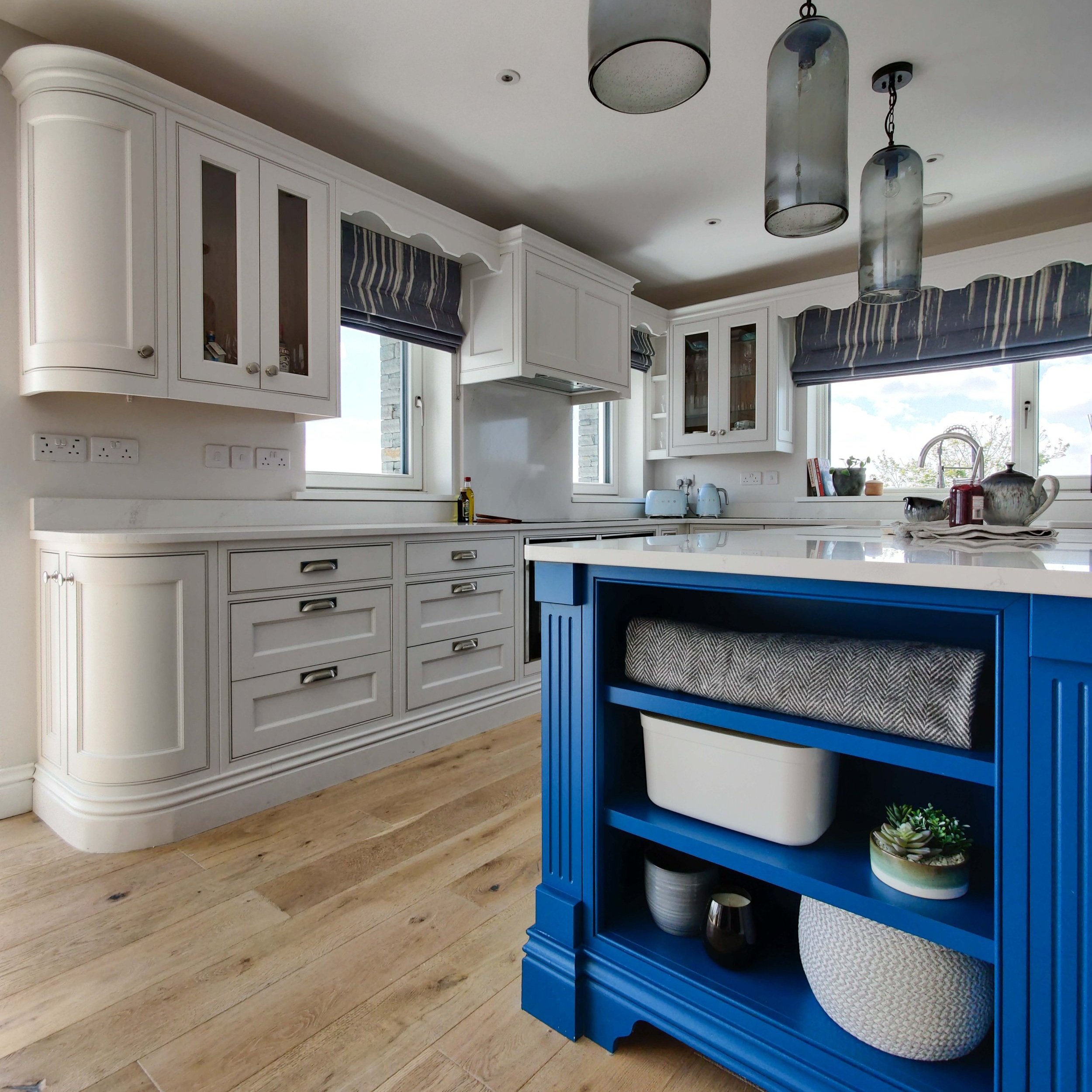 Classic Shaker Kitchen in frame design in Stiffkey Blue and Pointing white by Farrow and Ball - interior design by Serpentine Interiors
