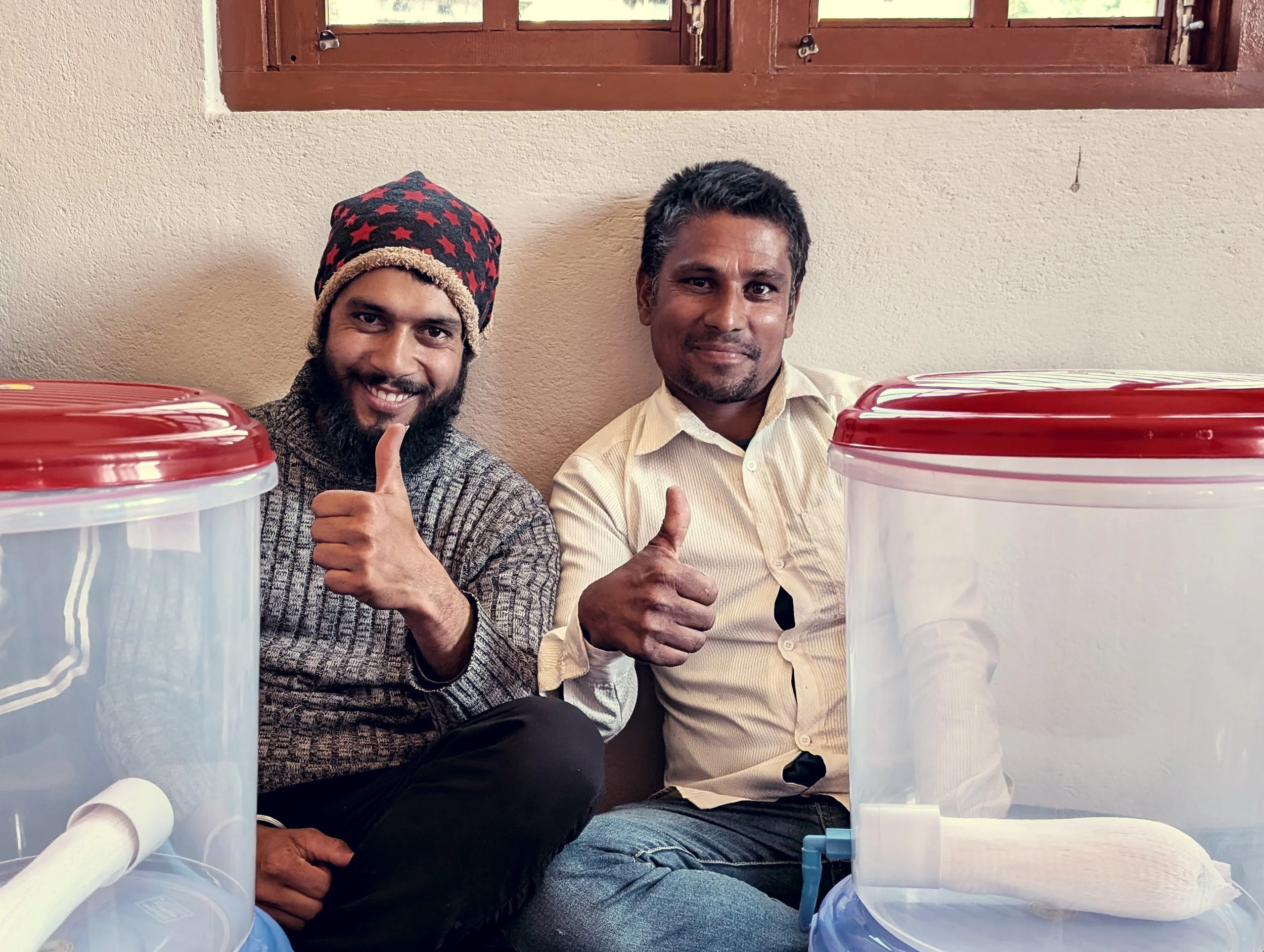 MightyWater_Nepal2024_MenThumbsUp_RobMiller.jpg