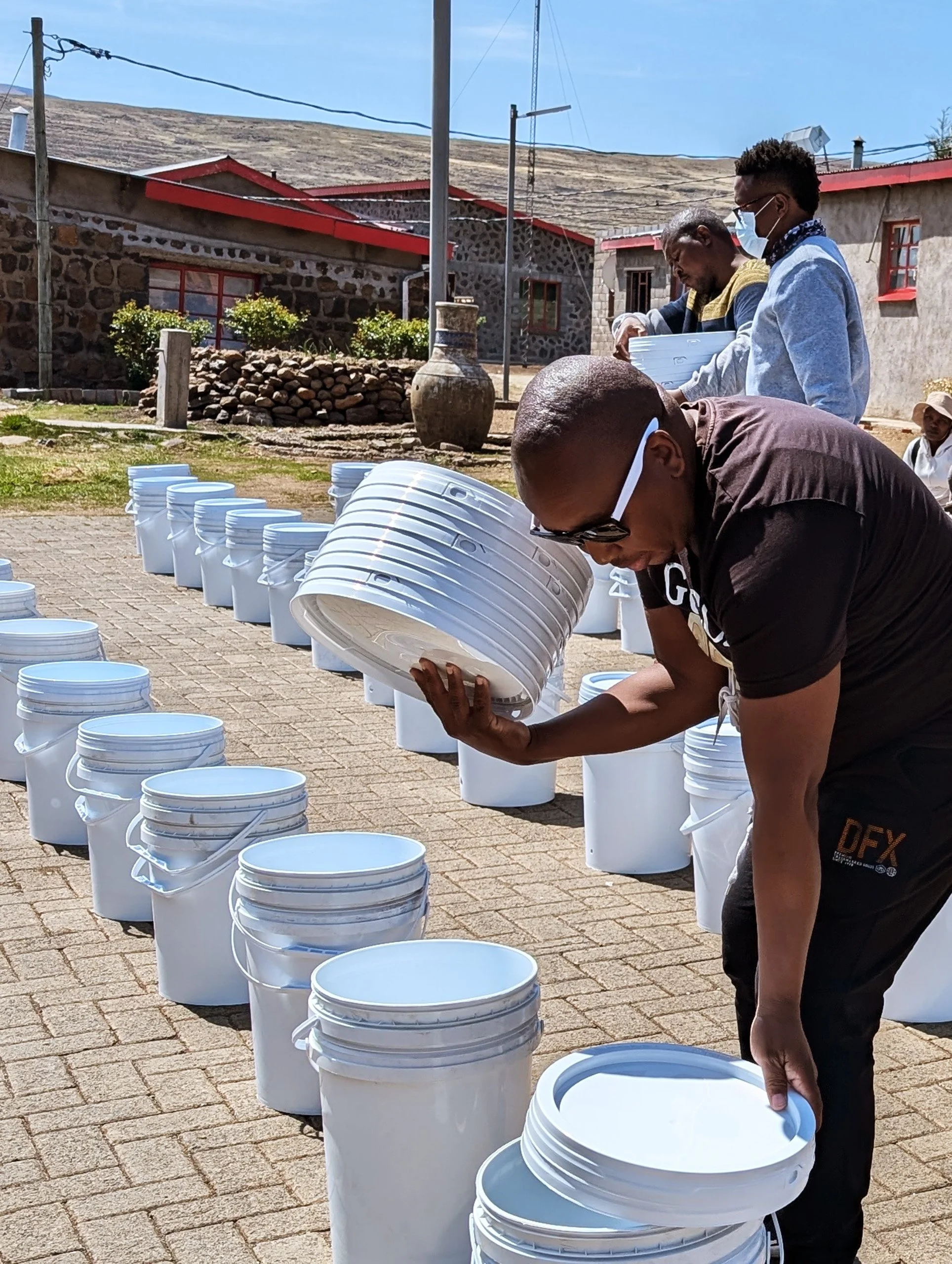 MightyWater_Lesotho2024_MonyaneRafiloeTaolanaSttingUp.jpg