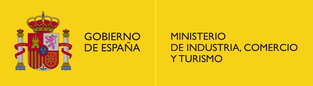 Logotipo del gobierno de España y del Ministerio de Industria, Comercio y Turismo en fondo amarillo
