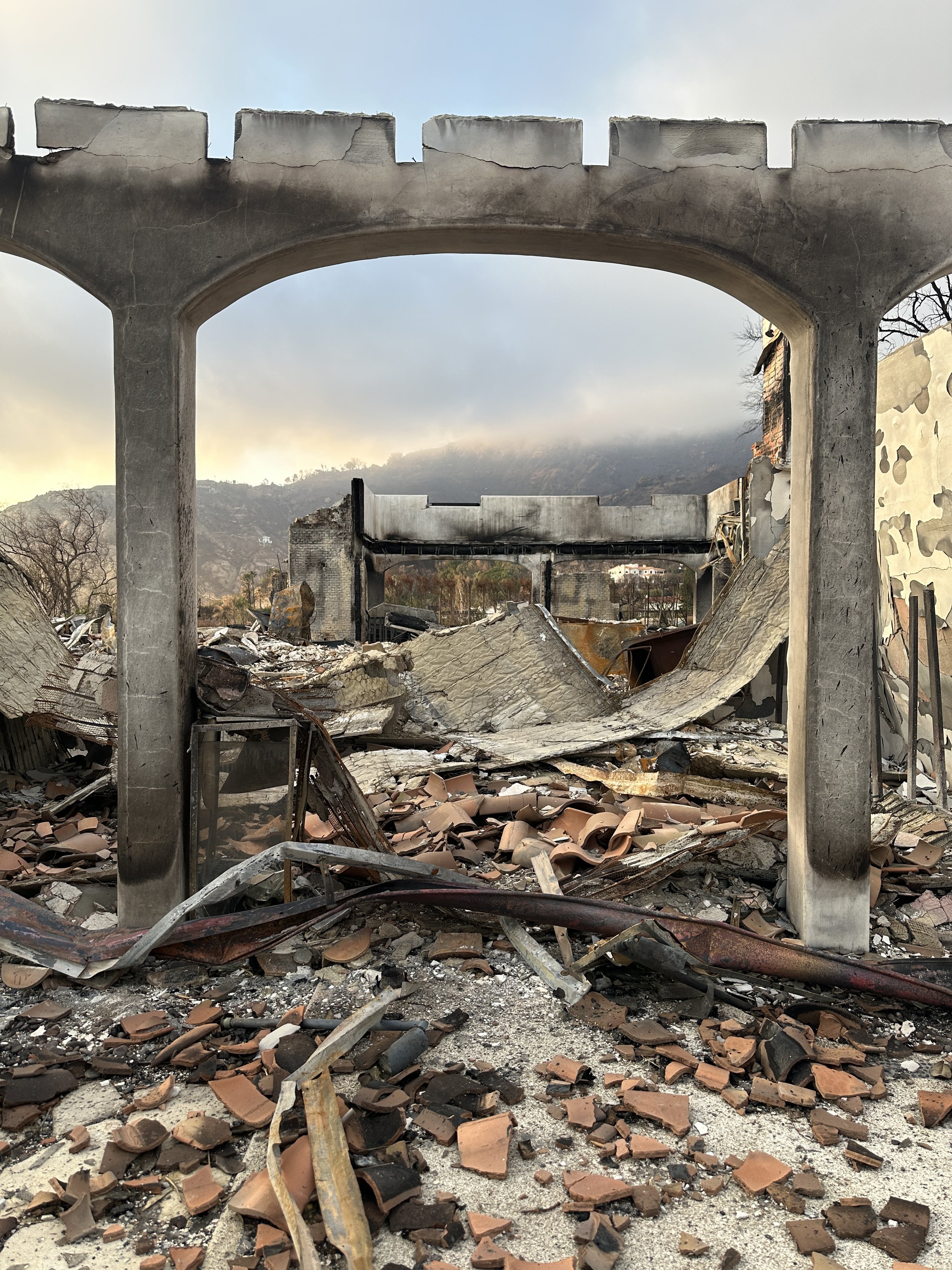 A home reduced to rubble in the Las Flores Canyon neighborhood in Malibu, California.  Photo credit: Adriana Cargill