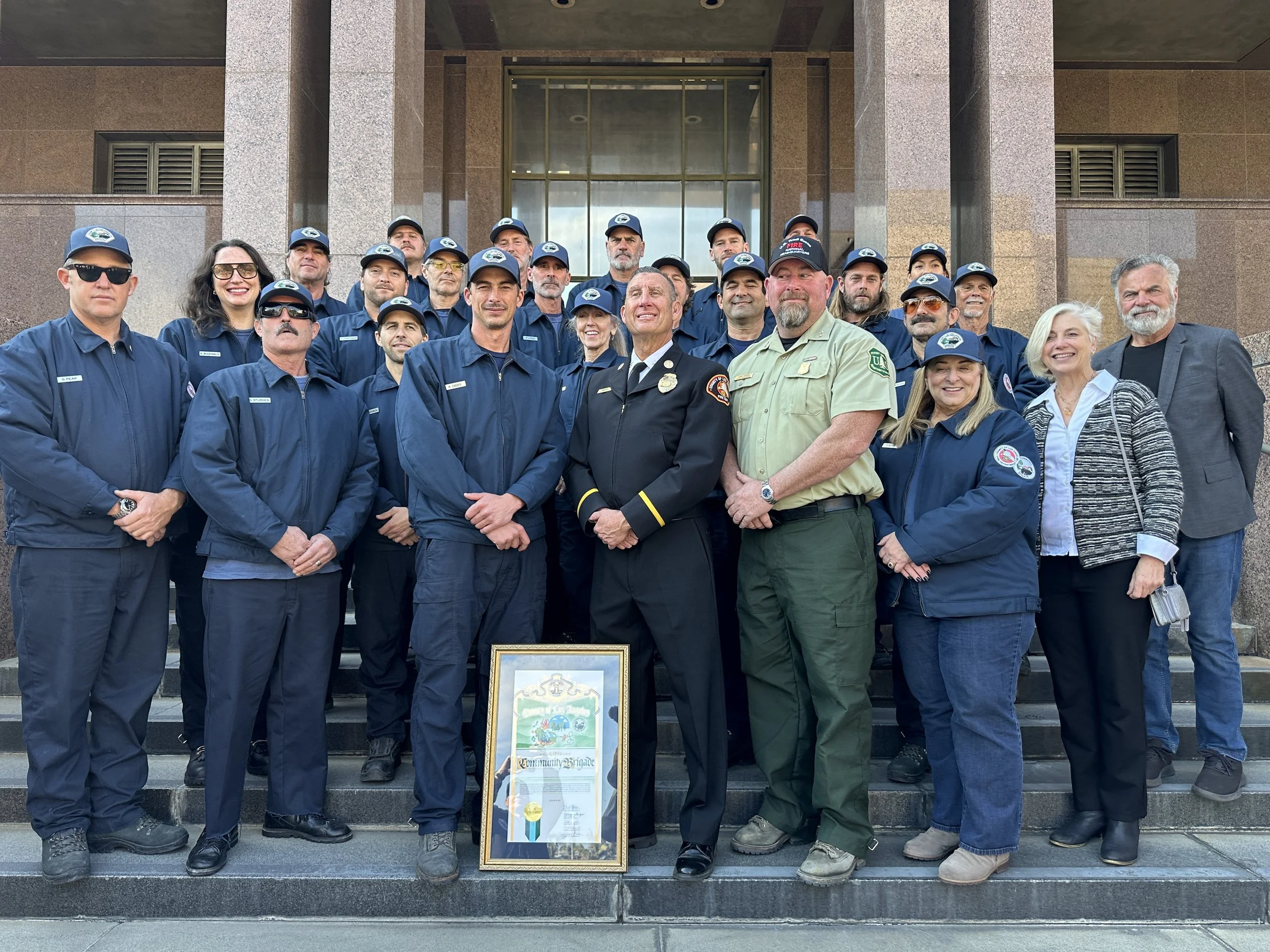 The community brigade outside of Los Angeles City Hall after receiving their award. Keegan
Gibbs stands center with Asst. Chief Drew Smith to right.  Photo credit: Adriana Cargill