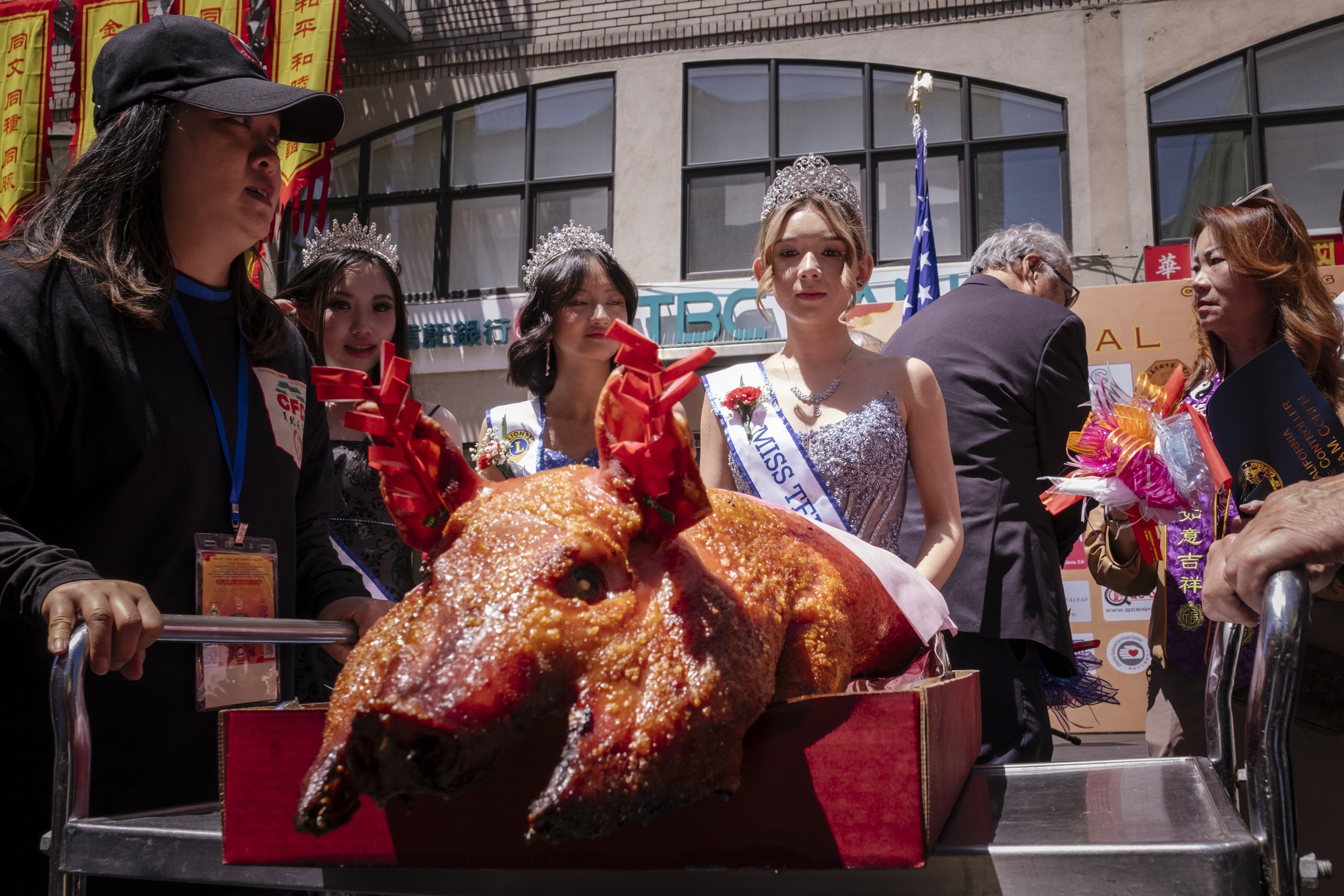 Kirby, stands in line to participate in a ribbon cutting ceremony, celebrating the third annual cultural festival in San Francisco's Chinatown, in California on May 31, 2026.  Kirby recently won the title of Miss Teen Chinatown 2026 in the 55th Teen 