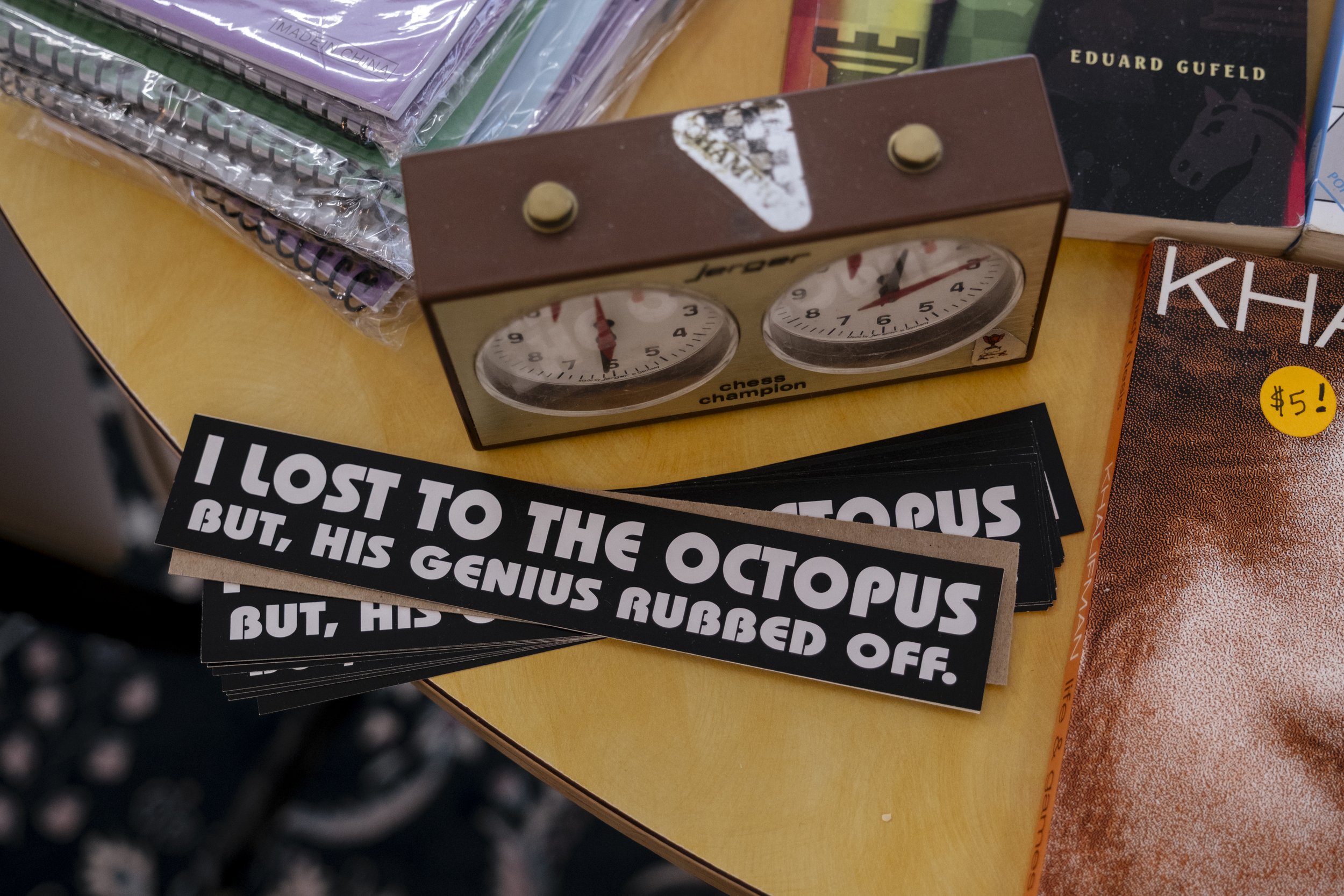 Nowak, also referred to as "The Octopus", is known around town as a local chess legend.  He recieved the nickname after proving he could beat many opponents at once, in varying simul matches, resembling the tentacles of an octopus.  After recieving t
