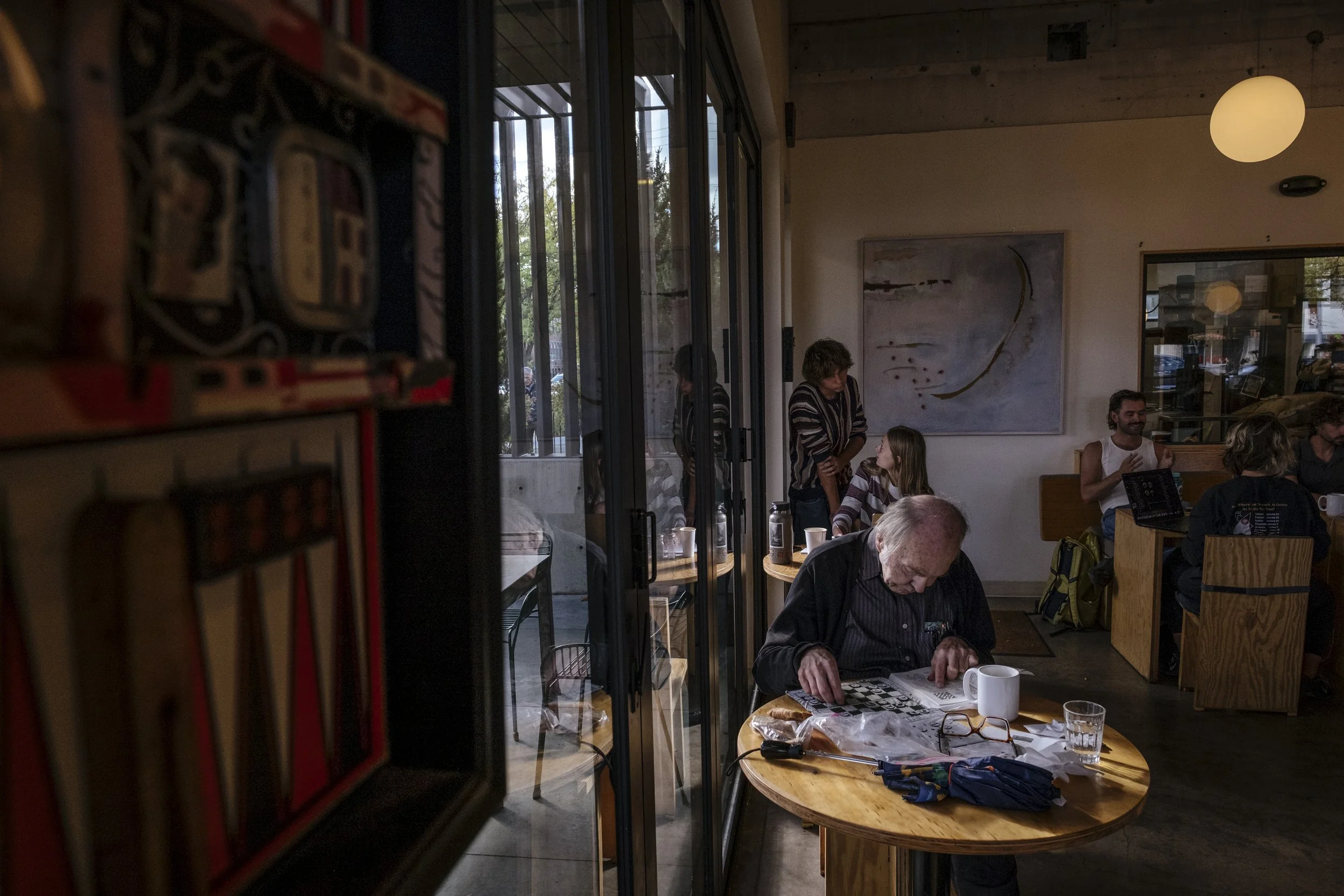 Greg Nowak studies chess at Clyde Coffee in Missoula Mt, on Oct. 1. Nowak spends each Sunday afternoon at Clyde, and will usually catch the #6 bus in order to go to the nearest Roseauars to get the hot bar for dinner. Having retired nearly 30 years a