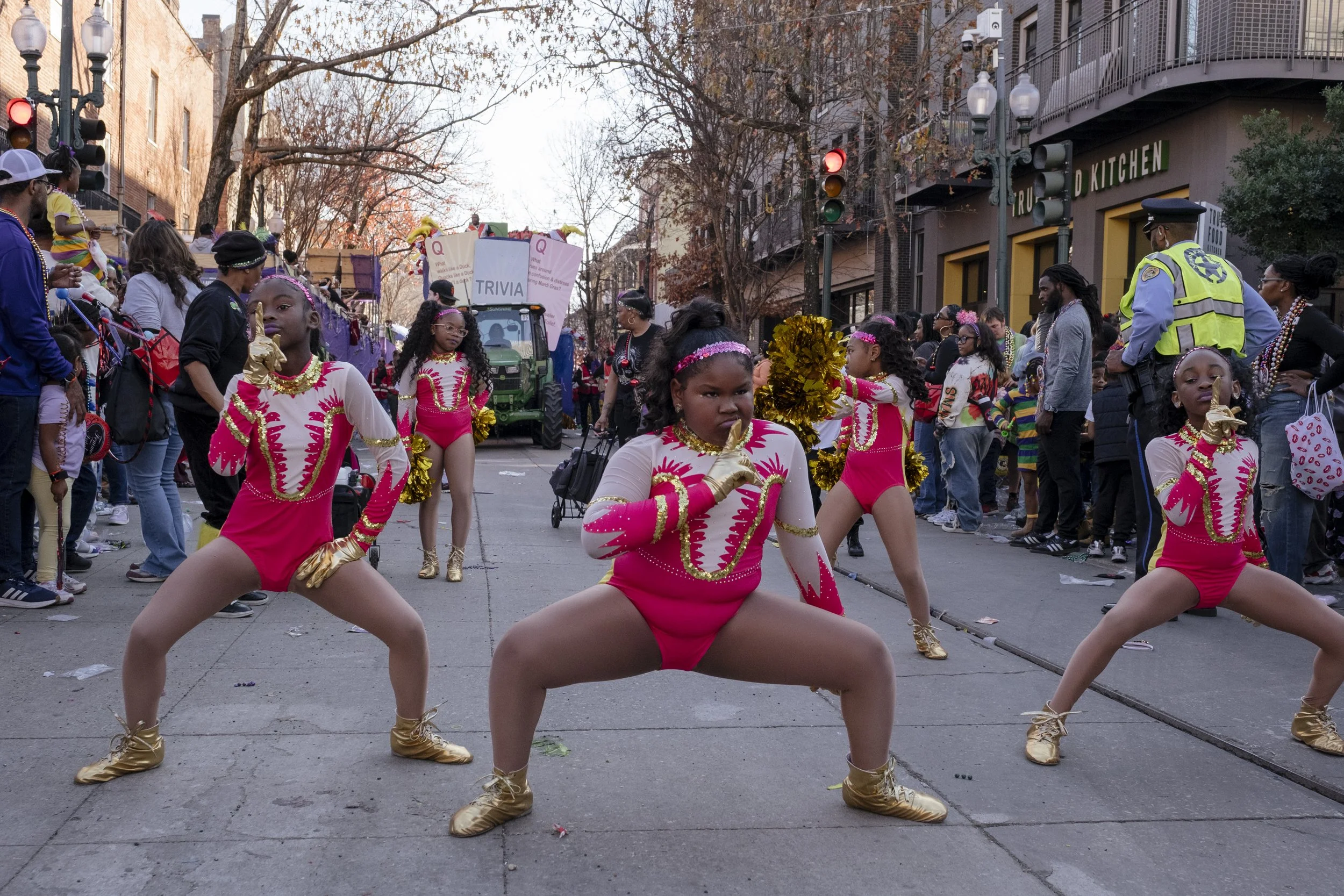 Members of the N.O.E Satin Dolls majorette dance group perform in the Mardi Gras Mystic Krewe of Femme Fatale parade in New Orleans, Louisiana, on February 8, 2026.  The girls use dancing as a release, for fun, and to express their creativity.