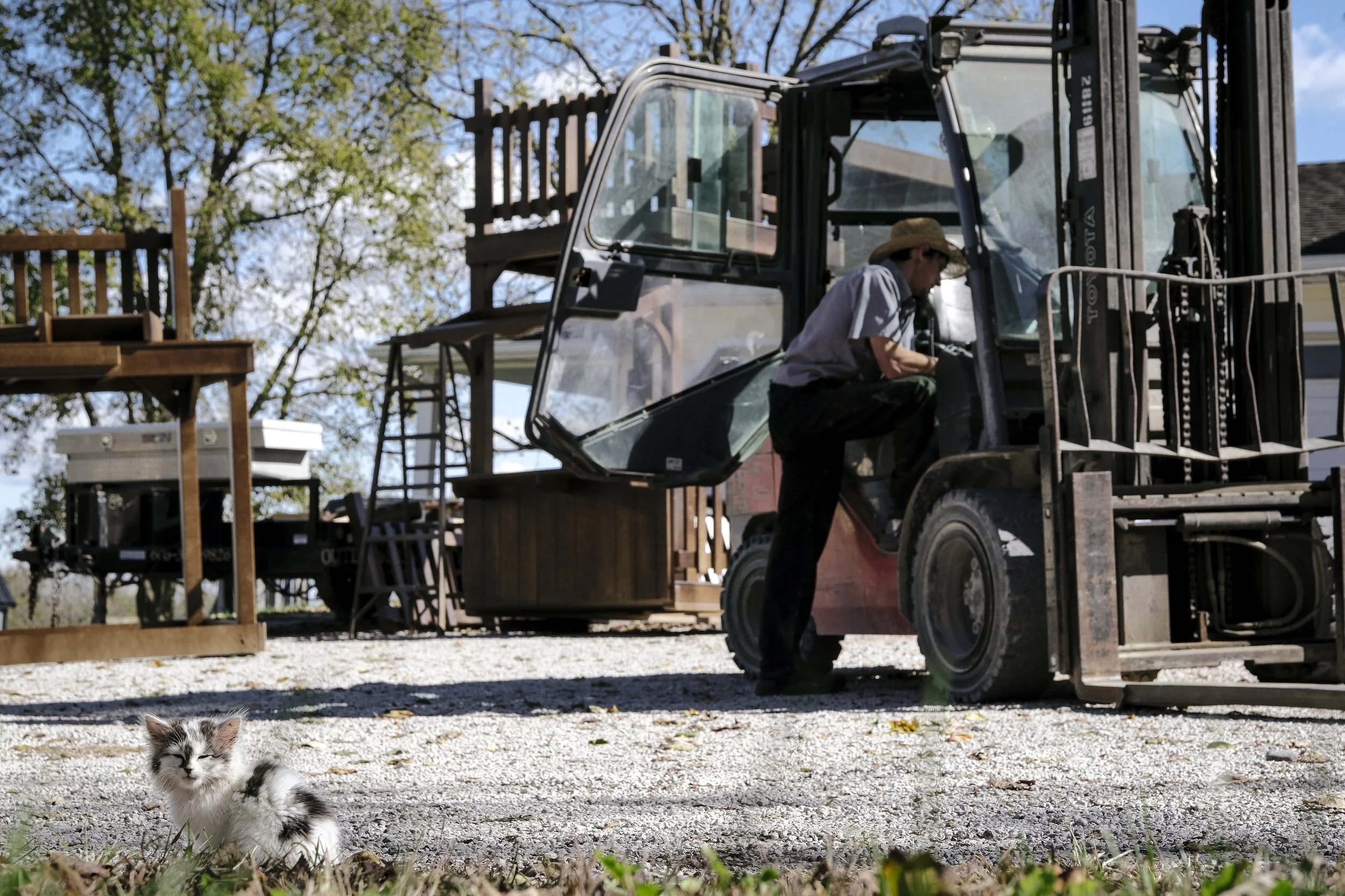 Sam Yoder takes a call from a neighbor on his black box phone, on Oct 22, in Mays Lick, Ky.  Black box phones are intended only for the use of work within this Amish community.