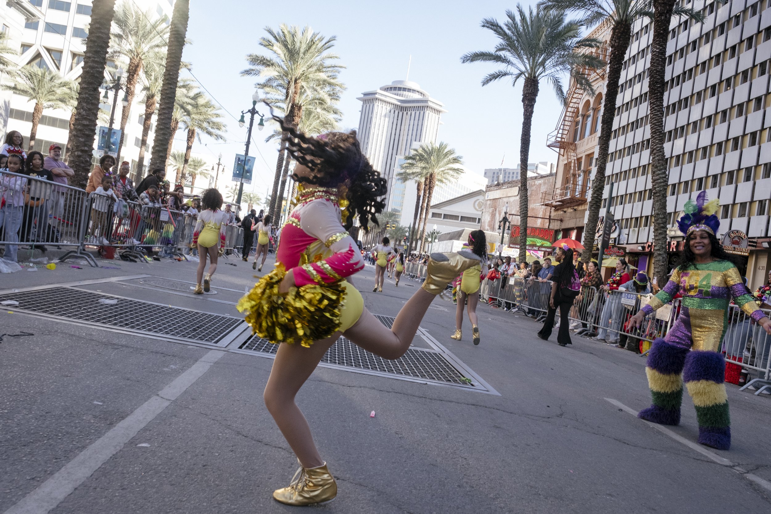 Karen Jordan, 60, hypes up one of her dancers in the N.O.E Satin Dolls performance in the Mardi Gras Mystic Krewe of Femme Fatale parade in New Orleans, Louisiana on February 8, 2026.  Jordan founded the dance school in 2017 after being a dancer hers
