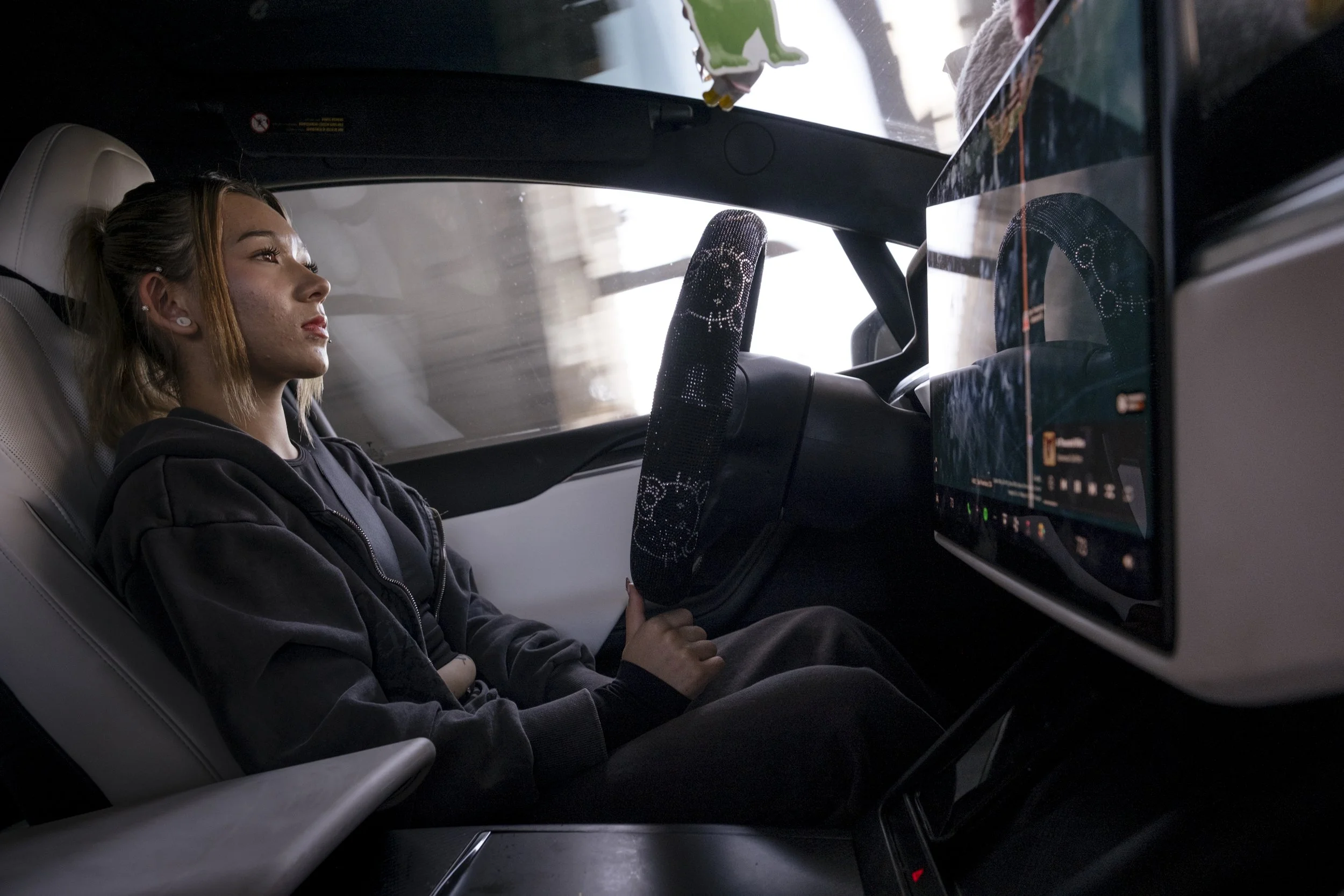 Kirby is driven by her self-driving Tesla to her club cheer practice in Tracy, California on June 1, 2026.  She bought her car specifically because it could self-drive, because of her lingering health conditions.  Before she got her liscense, she had