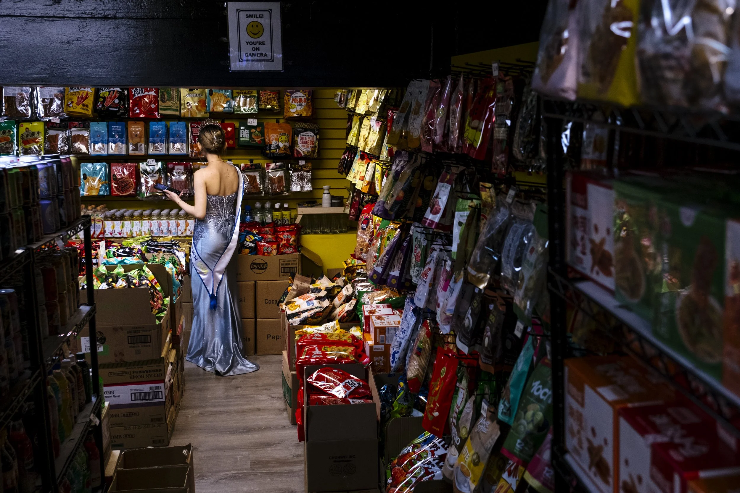 Kirby shops in a grocery store in San Francisco's Chinatown on May 31, 2026.  Although she moved away from Chinatown at a young age, her mom has always worked here.  "I got to stay deeply connected with Chinatown, thankfully.  Even though I moved to 