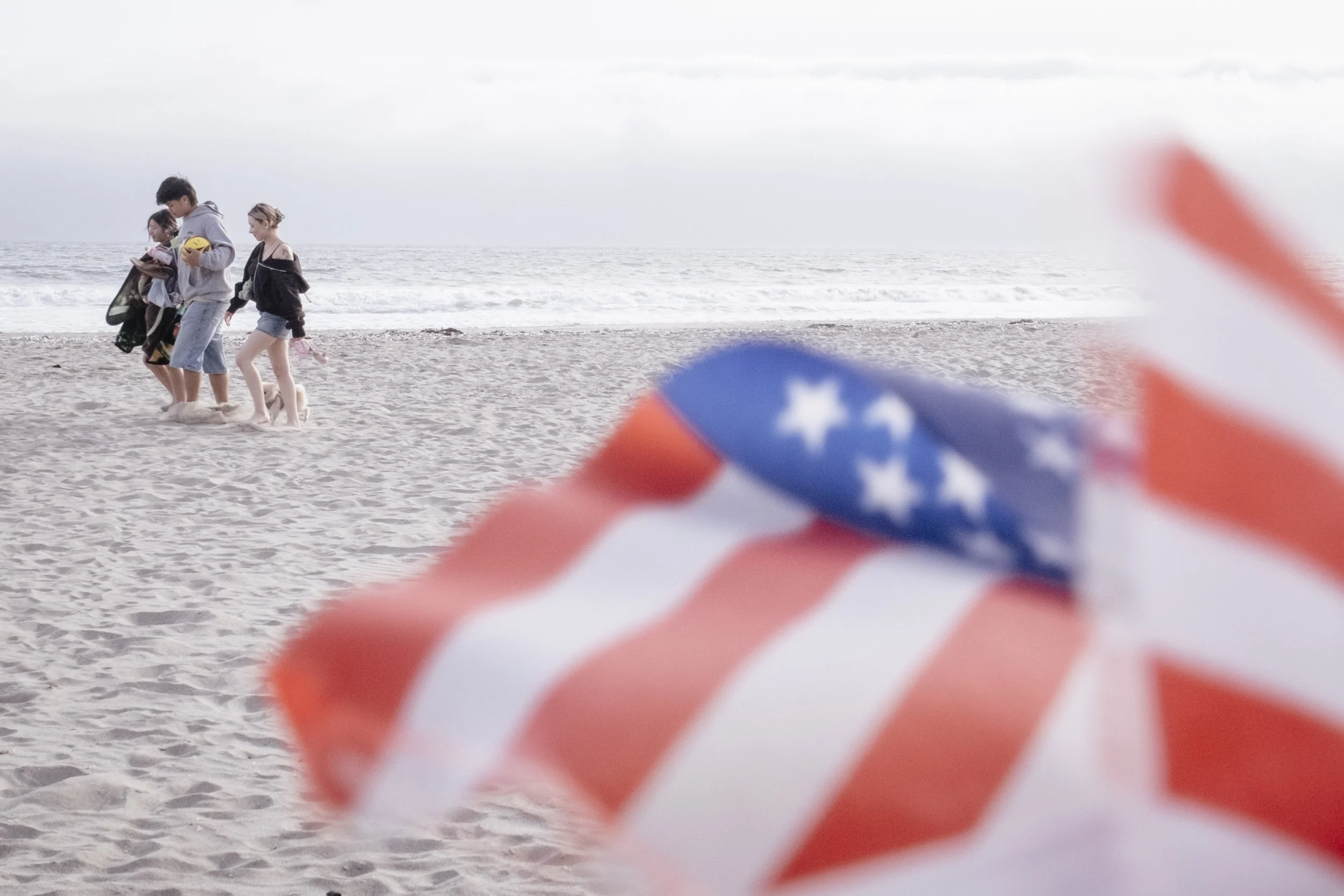 Kirby walks with her boyfriend and friend to head back to Chinatown for the evening, after spending the day on Stinson Beach in Marin County, California on June 2, 2026. 

"Chinatown literally doesn't feel like I'm in California.," said Kirby.  "And 