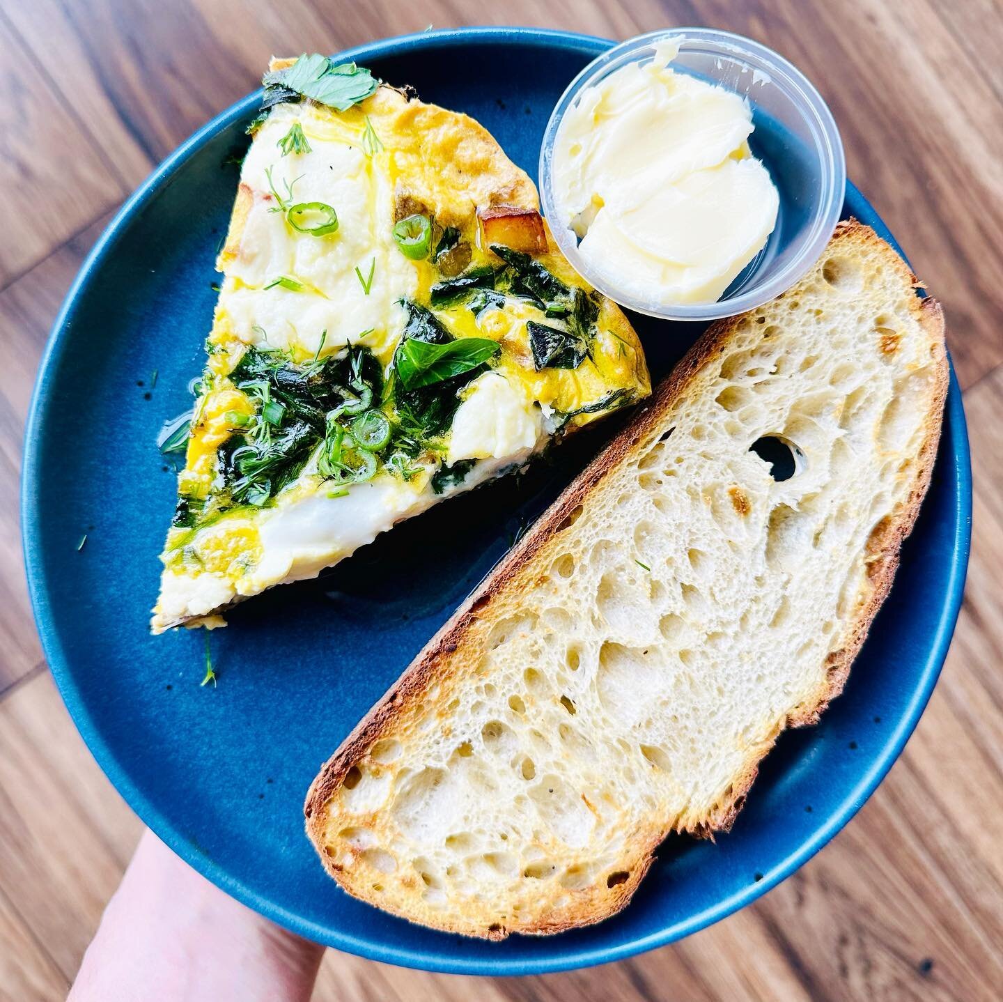 Potato, ramp &amp; pea tendril frittata w/ fresh ricotta served w/ sourdough toast for your Sunday Morning pleasure!

Scott went out and got the ramps from the forest! 🌲🧑&zwj;🌾

#mariasbreadsandwiches #sunday #frittata #breakfast #lunch #collingsw