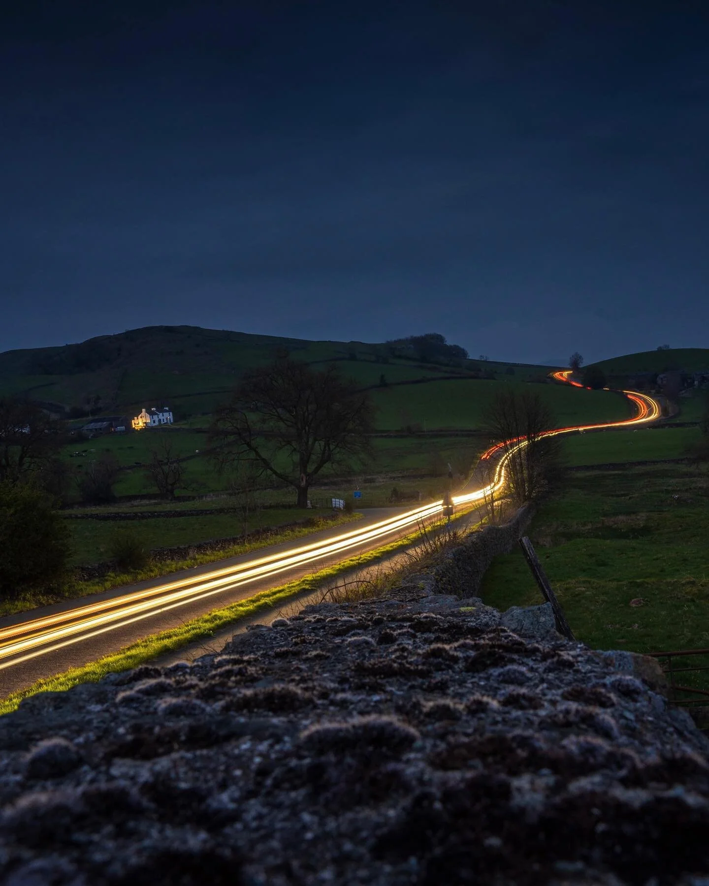 LIGHT TRAILS π
Bannerigg on the A591 is just amazing but if road with a up π and a down and a round and round π΅‍π«. 
No tripod present just a Lakeland wall and a make shift rest. 
Love that the house is lit up too! 
#LakeDistrict #Adventure