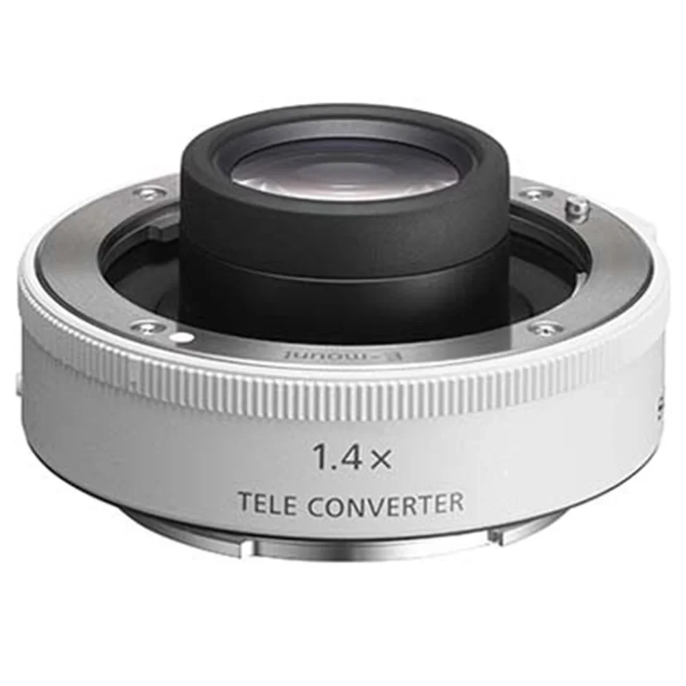 Close-up of a camera lens teleconverter labeled 1.4x for extending focal length.