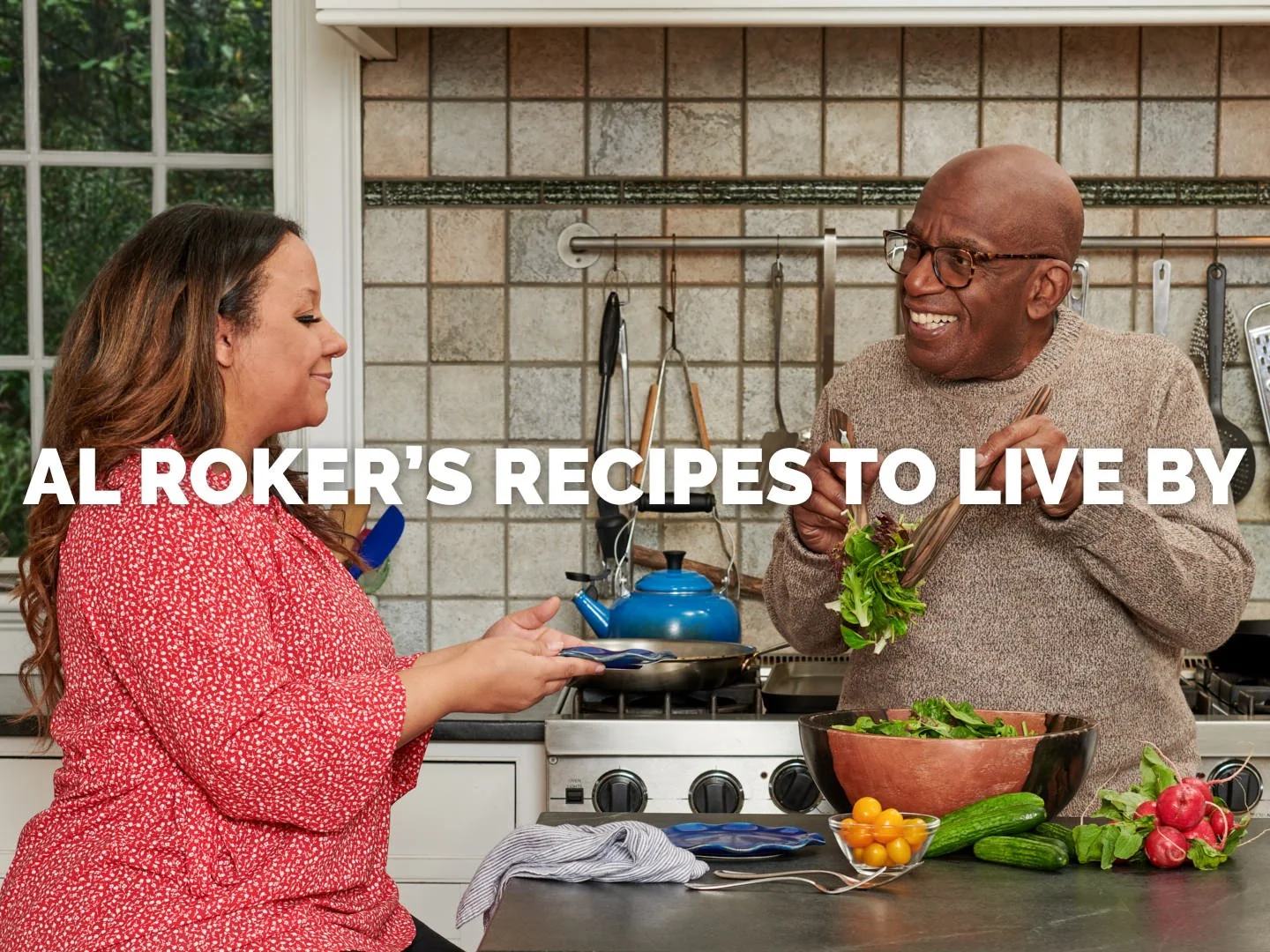 A lively and inviting editorial food photography shot featuring Courtney Roker-Laga and her father Al Roker in a home kitchen setting, preparing a fresh salad with vibrant ingredients. This image highlights the collaboration behind Al Roker’s Recipes