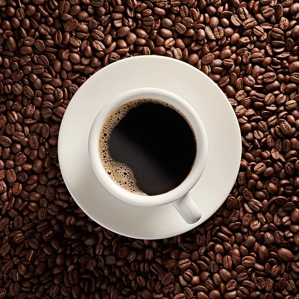 Coffee Cup on Bed of Roasted Coffee Beans Photo Print