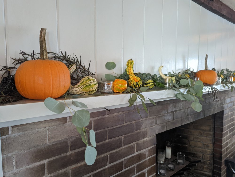 1754 House fireplace, and foliage courtesy of florist
