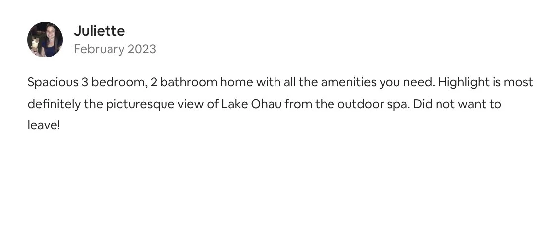 Screenshot of a Facebook review by Juliette describing a home with a view of Lake Ohau, showing a profile picture of a woman with dark hair, smiling, wearing a dark top, and the text of the review dated February 2023.