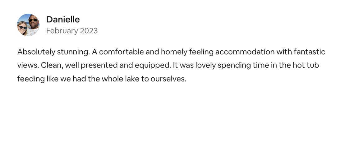 A customer review dated February 2023 praising a hot tub for its views, cleanliness, presentation, and feeling of homey comfort. They mention spending time feeding the hot tub as if they had the whole lake to themselves.