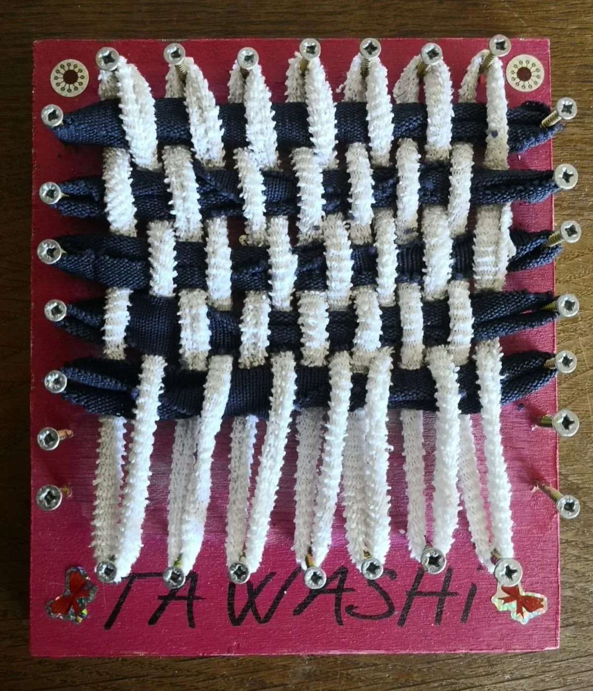 tawashi board and old clothe strips to makes tawashi zero-waste, non-toxic sponges