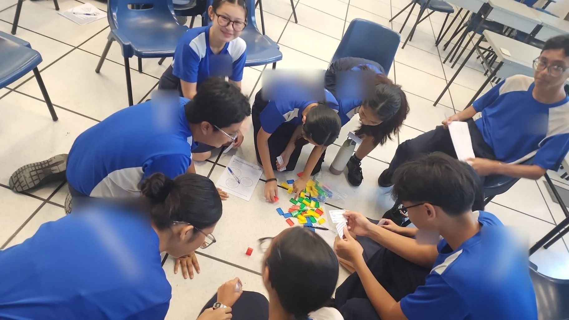 Student leaders work through a team communication challenge