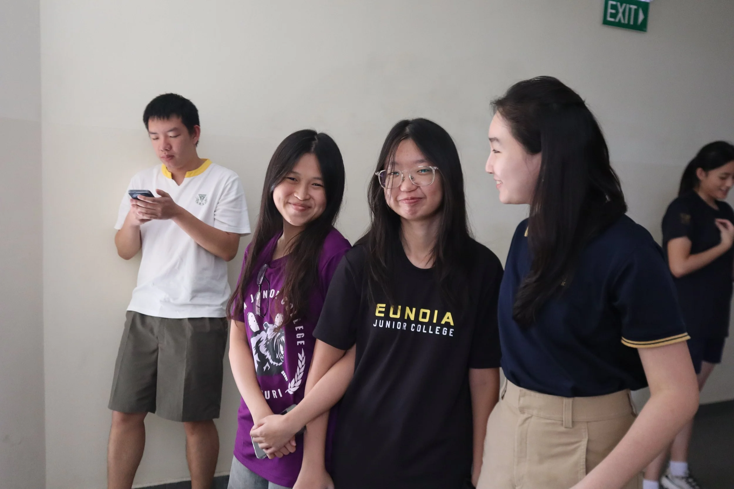 students laughing between activities; the most human and warm moment in the landscape set
