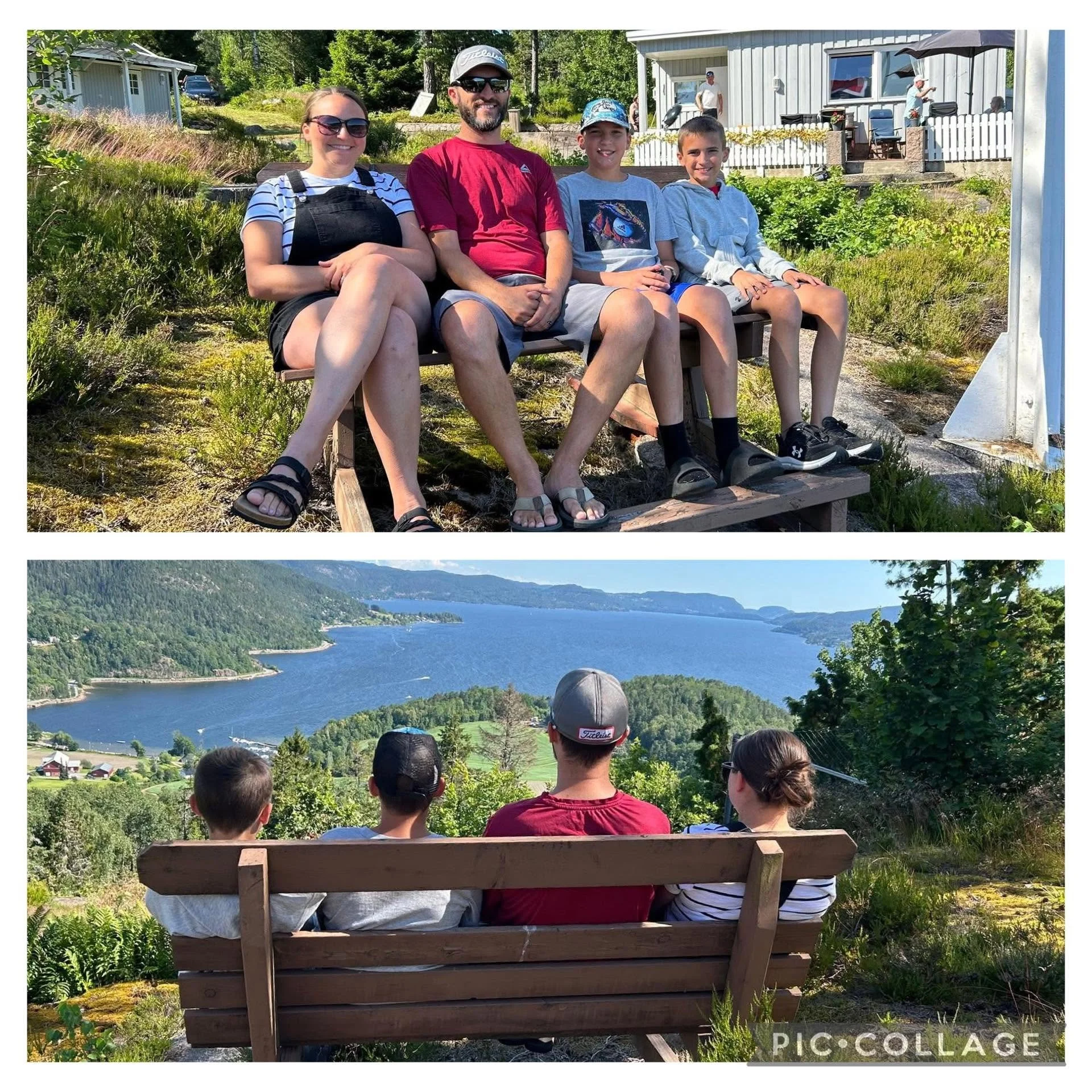 View from behind of a wooden bench with five people sitting on it, overlooking a scenic landscape of a large lake with forested mountains in the distance, on a sunny day.