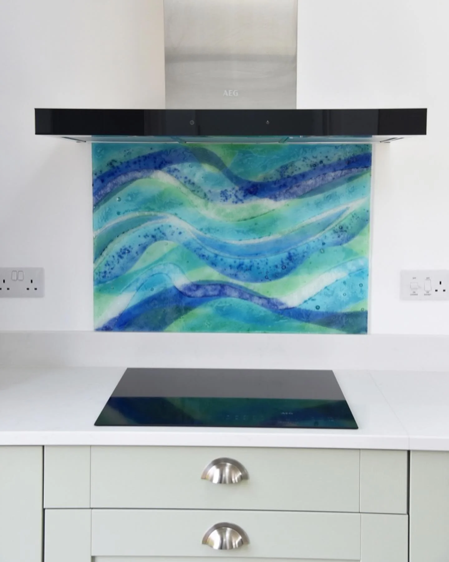 I actually remembered to take some photos of this one!
Here&rsquo;s one of my splashbacks I fitted for clients in Cornwall last week.  They saw a wall hanging in my studio in which they liked the oceanic colours and textures. 
We made some tweaks - a
