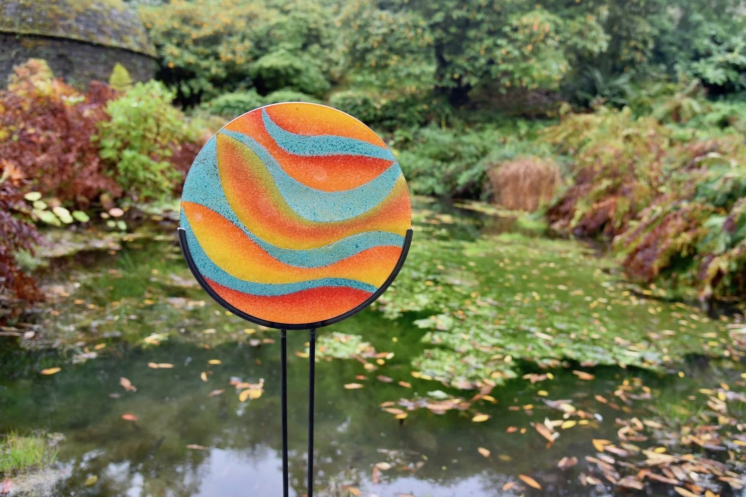 Orange fish glass garden art
